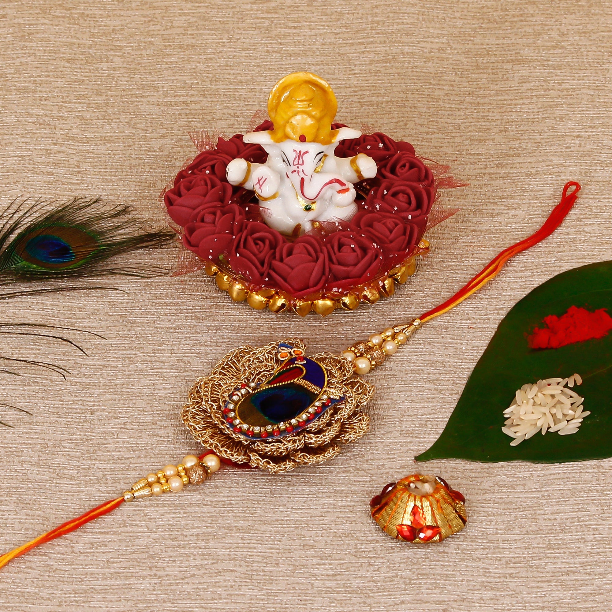 Designer Peacock Rakhi with Lord Ganesha Idol on Decorative Plate for Car & Home and Roli Tikka Matki Kafalo