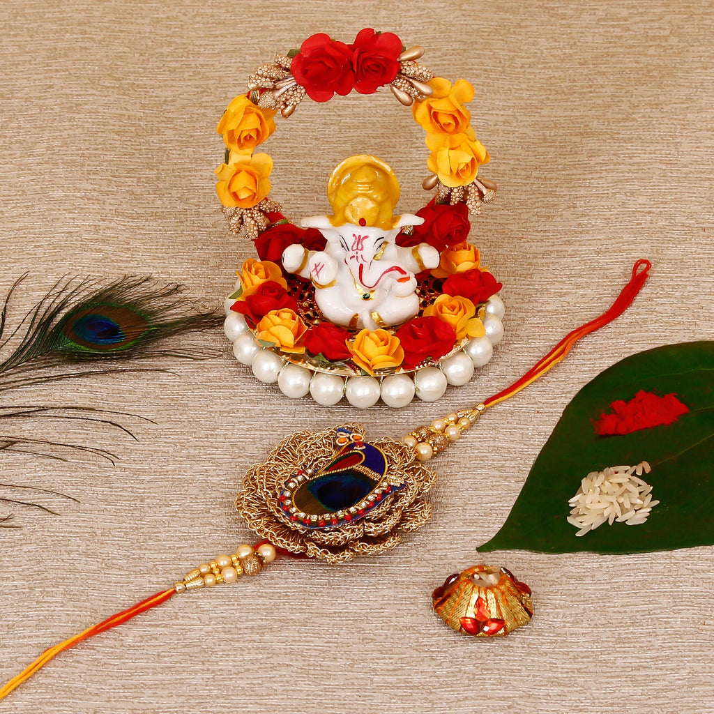 Designer Peacock Rakhi with Lord Ganesha Idol on Decorative Plate for Car & Home and Roli Tikka Matki Kafalo