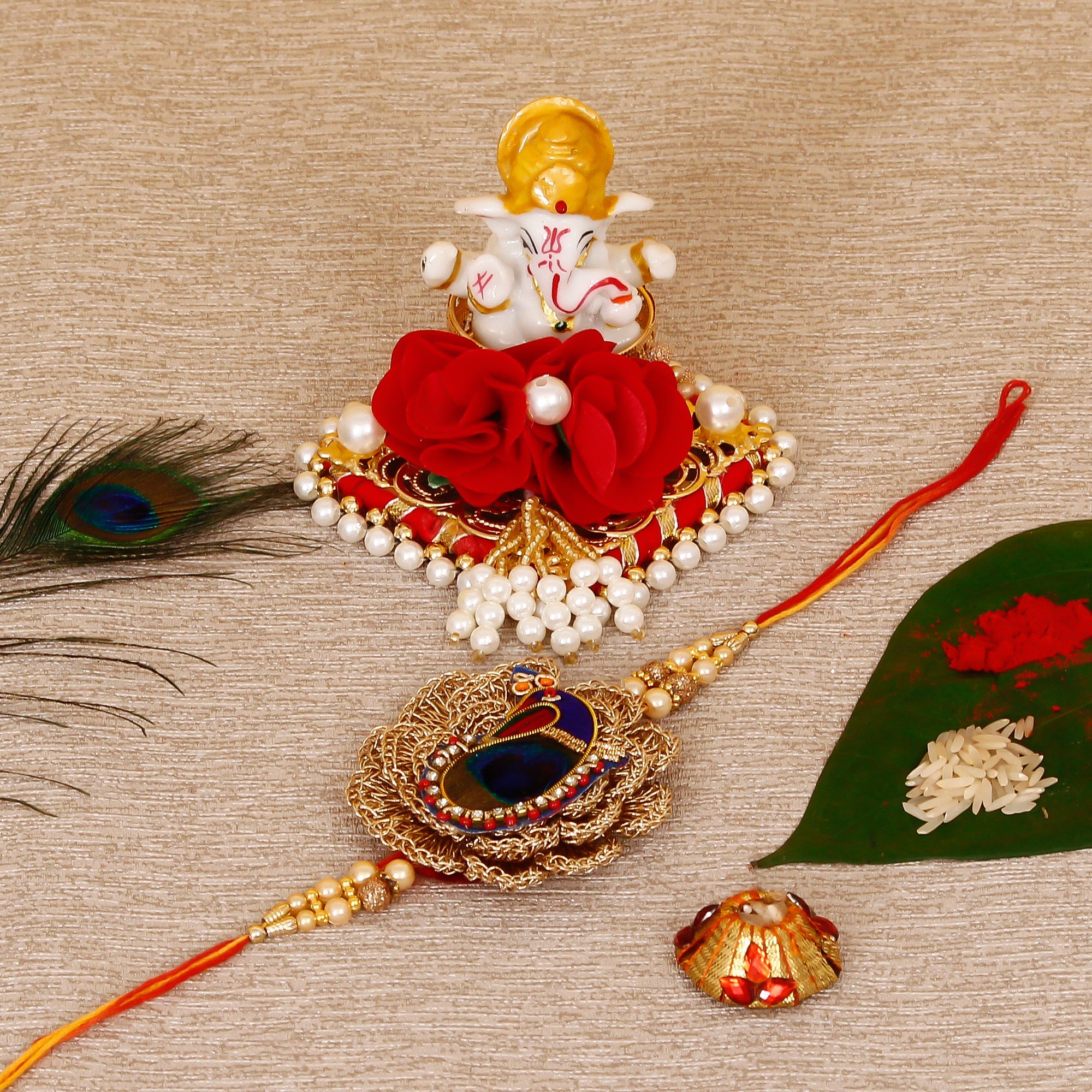Designer Peacock Rakhi with Lord Ganesha Idol on Decorative Plate for Car & Home and Roli Tikka Matki Kafalo
