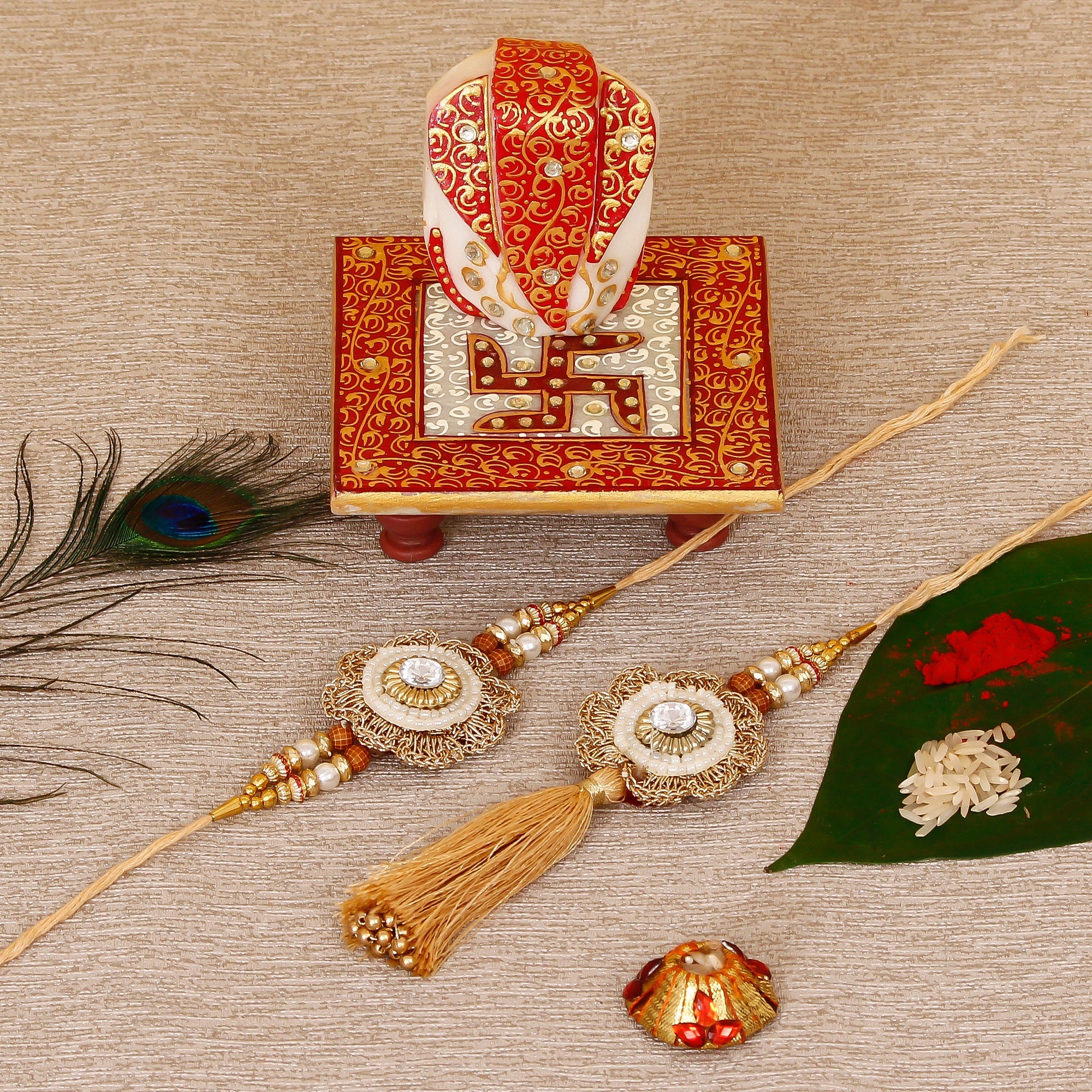 Designer Bhaiya Bhabhi Rakhi with Ridhi Sidhi Marble chowki and Roli Tikka Matki Kafalo