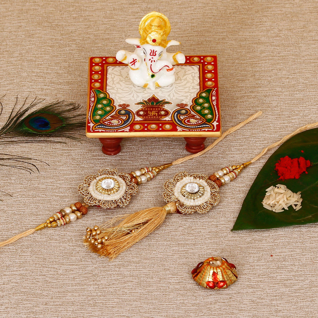 Designer Bhaiya Bhabhi Rakhi with Lord Ganesha Marble Chowki and Roli Tikka Matki Kafalo