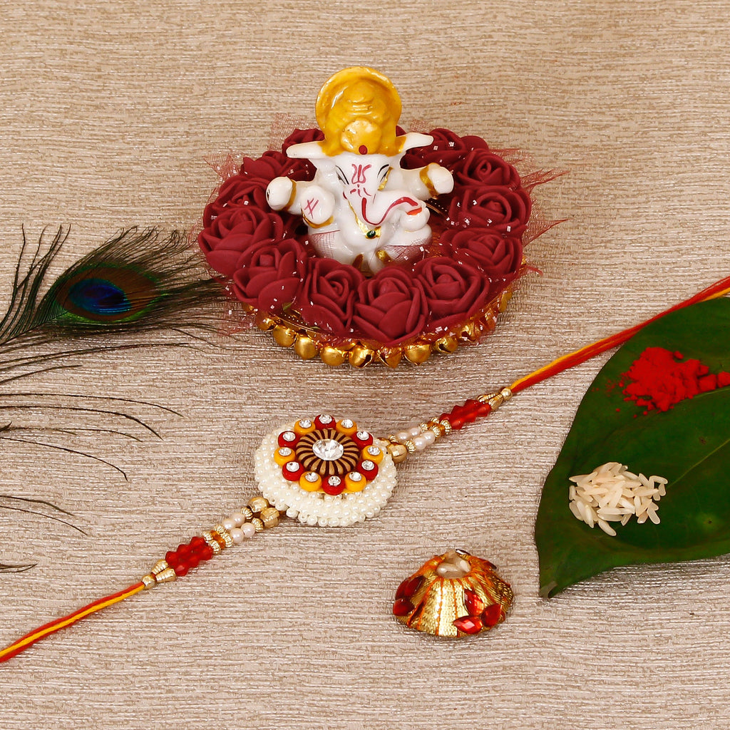 Designer Rakhi with Lord Ganesha Idol on Decorative Plate for Car & Home and Roli Tikka Matki Kafalo