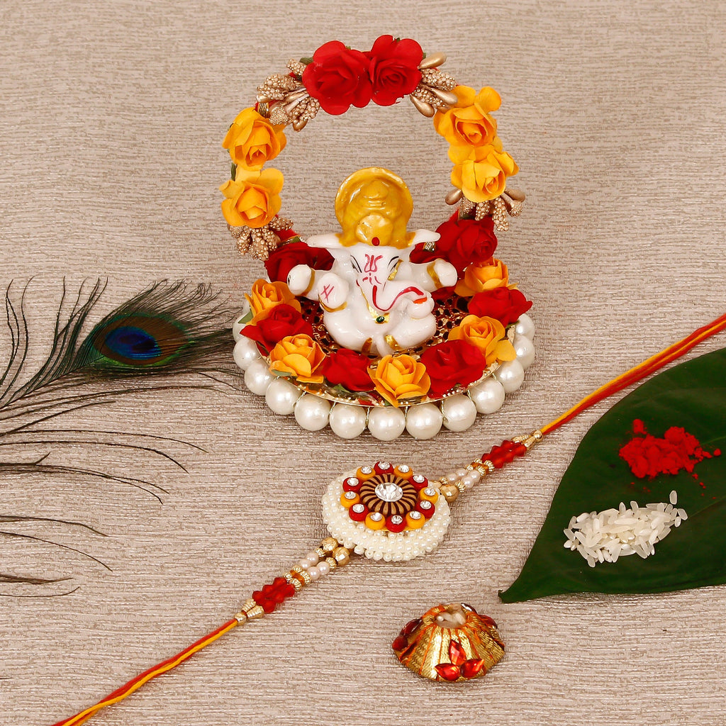 Designer Rakhi with Lord Ganesha Idol on Decorative Plate for Car & Home and Roli Tikka Matki Kafalo