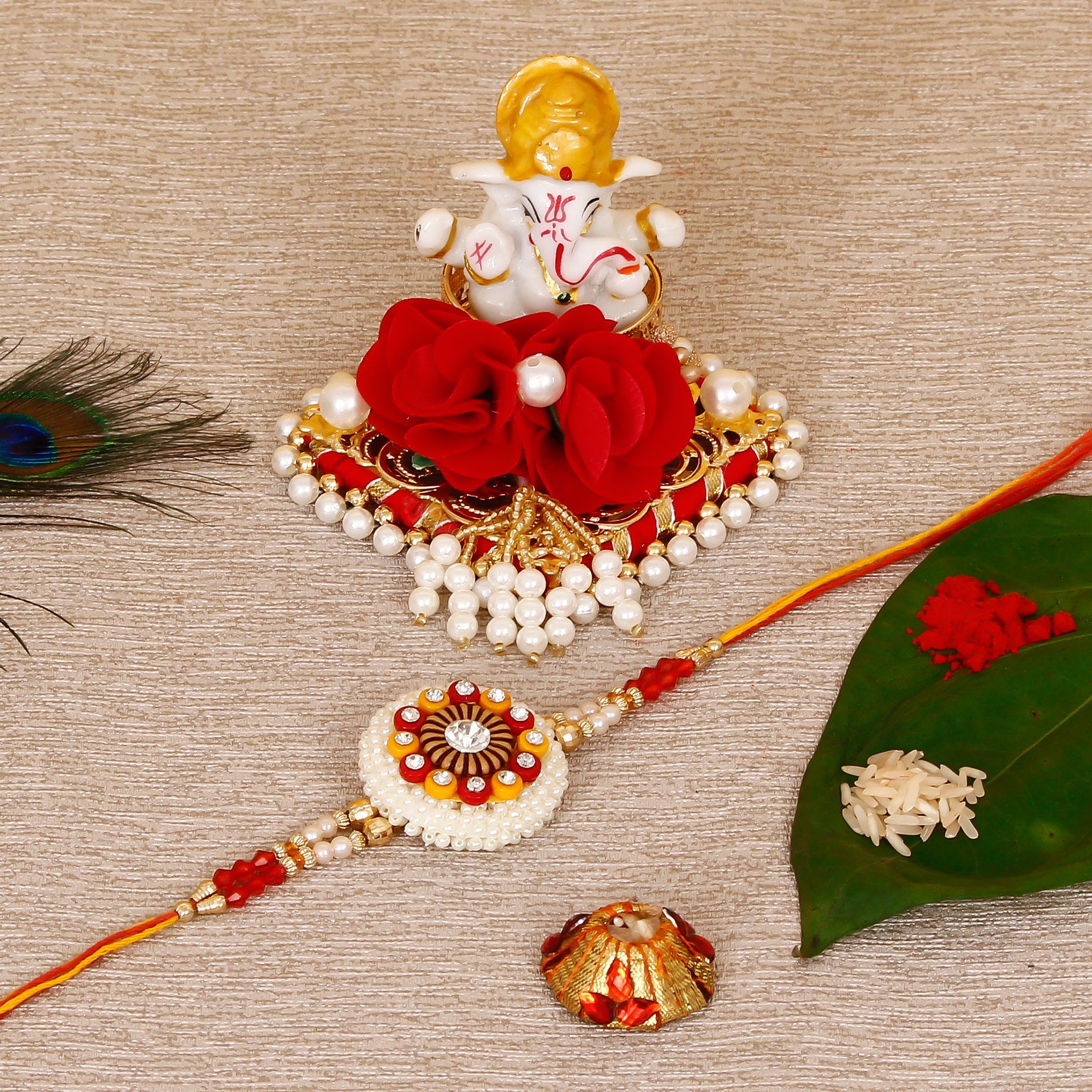 Designer Rakhi with Lord Ganesha Idol on Decorative Plate for Car & Home and Roli Tikka Matki Kafalo