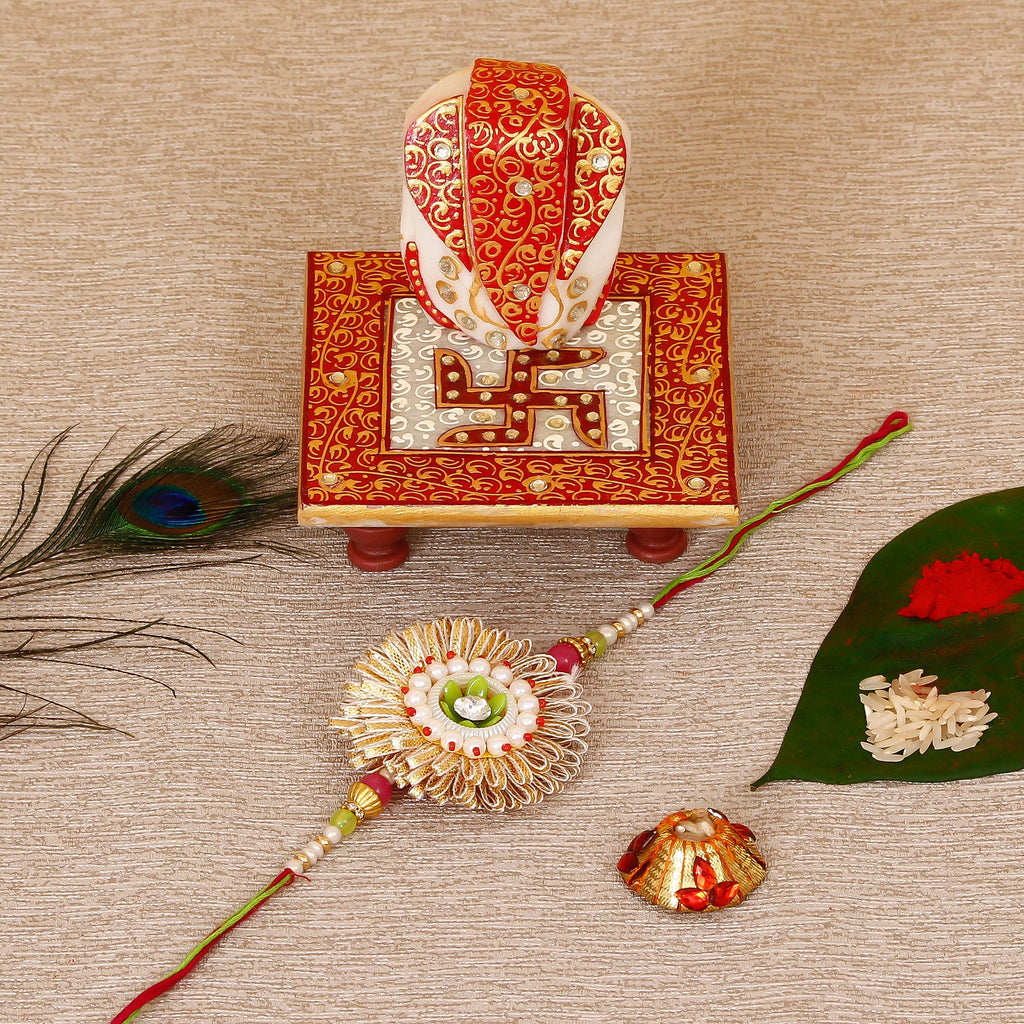 Designer Rakhi with Ridhi Sidhi Marble chowki and Roli Tikka Matki Kafalo