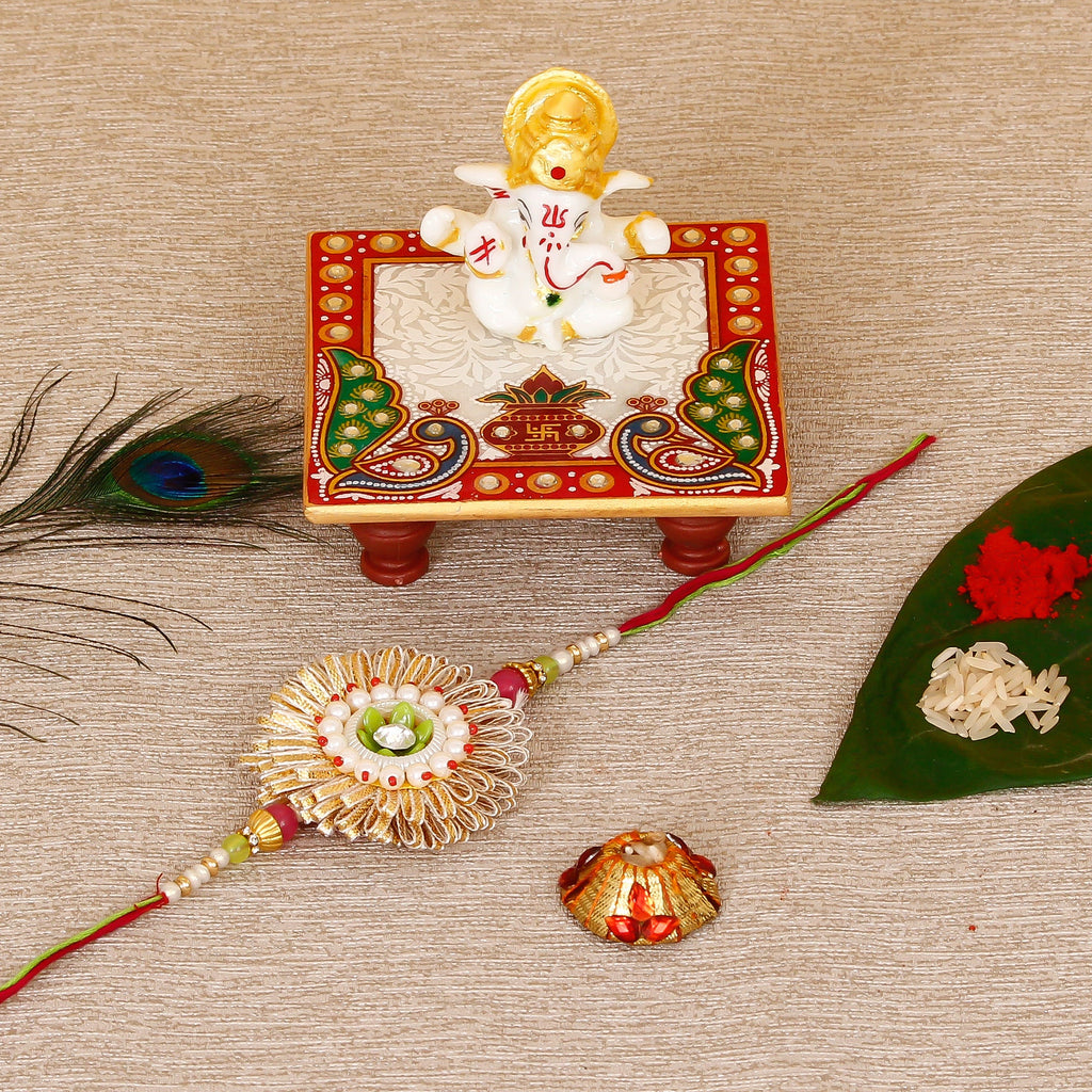 Designer Rakhi with Lord Ganesha Marble Chowki and Roli Tikka Matki Kafalo
