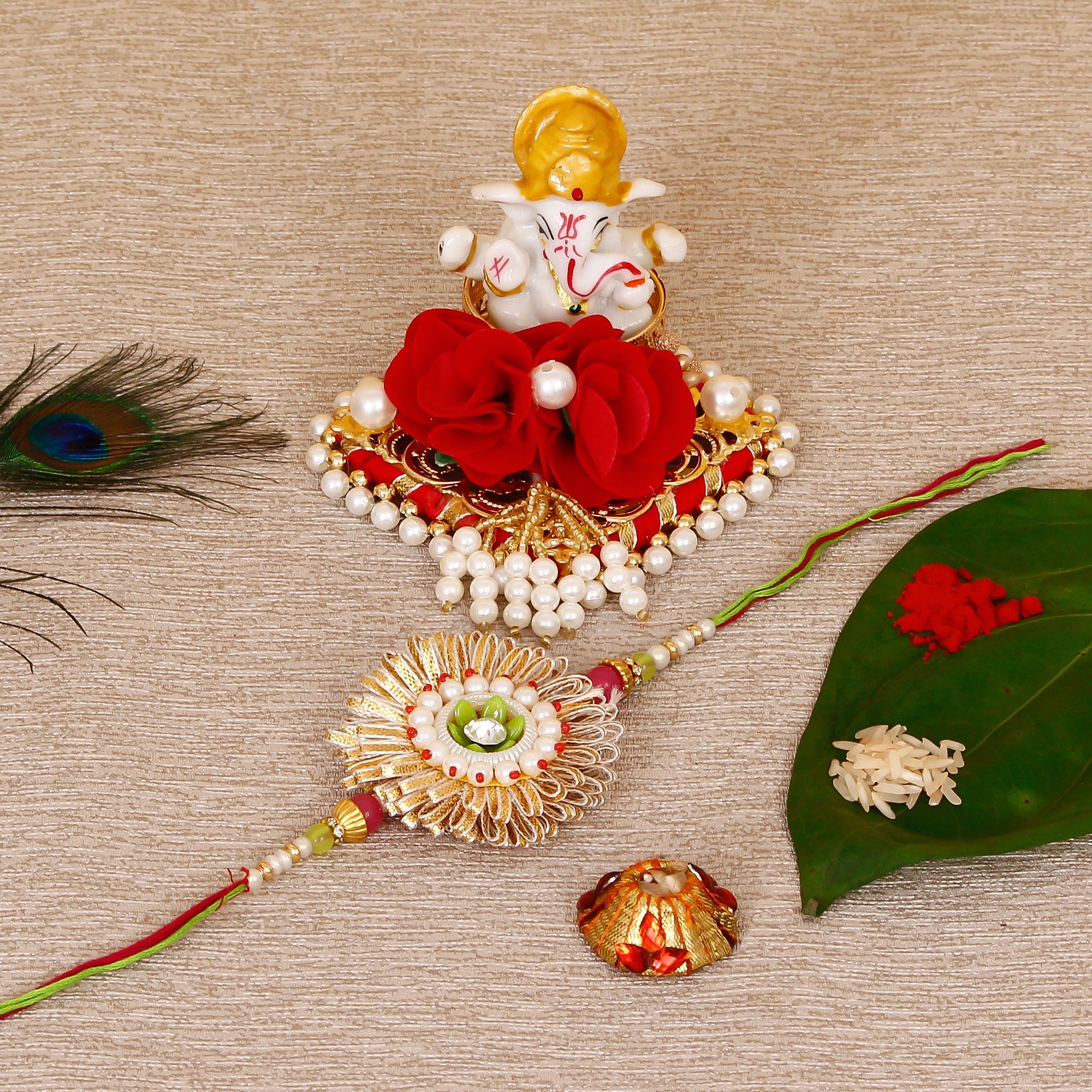 Designer Rakhi with Lord Ganesha Idol on Decorative Plate for Car & Home and Roli Tikka Matki Kafalo