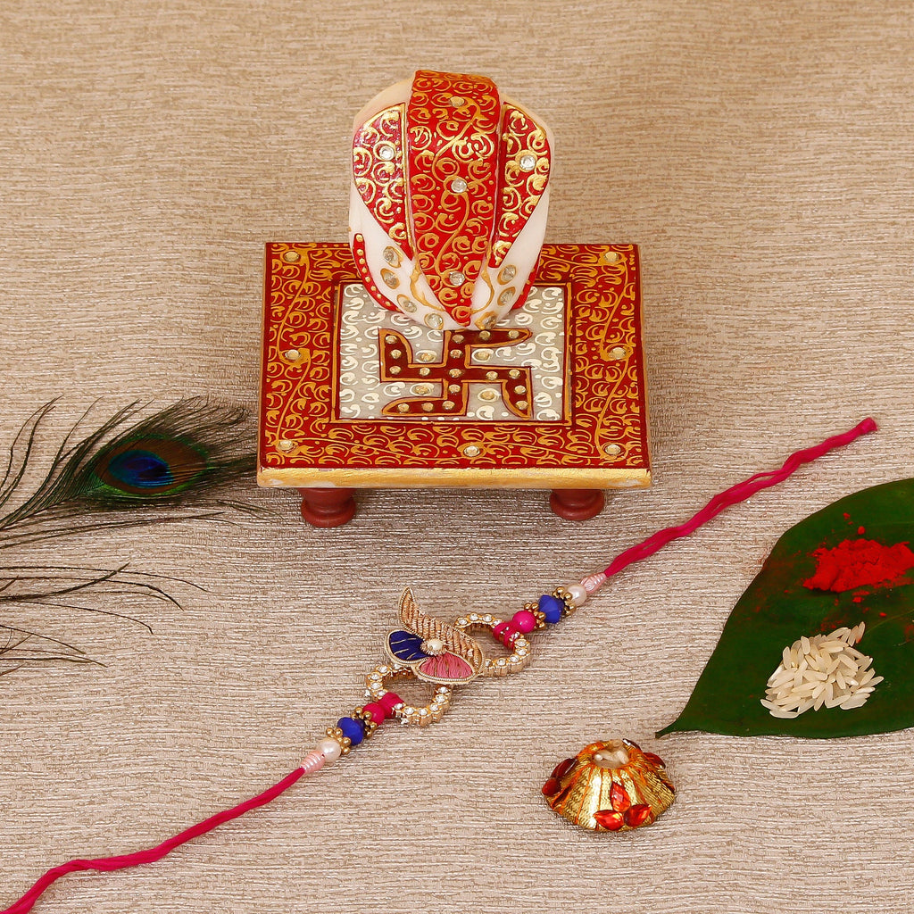 Designer Rakhi with Ridhi Sidhi Marble chowki and Roli Tikka Matki Kafalo