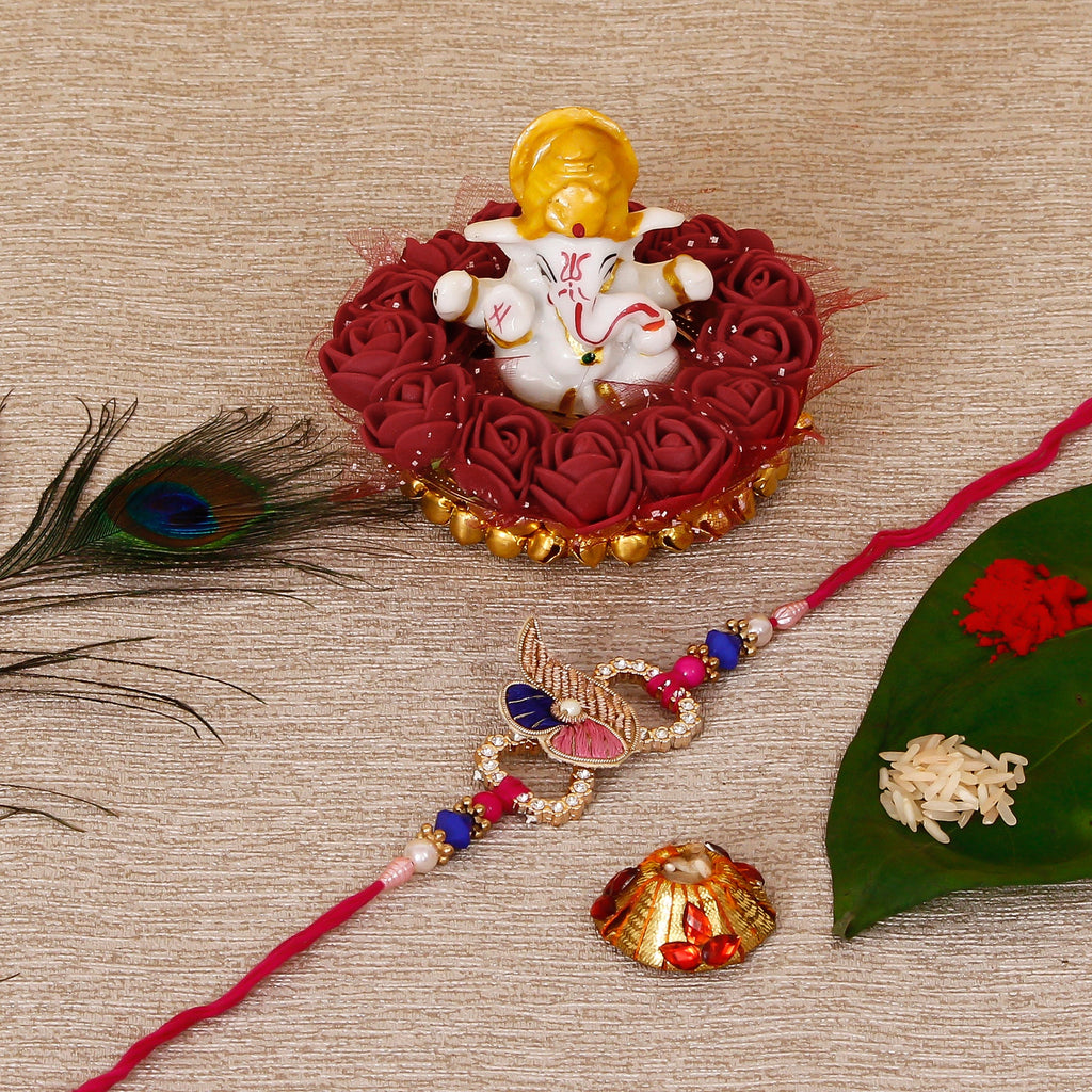 Designer Rakhi with Lord Ganesha Idol on Decorative Plate for Car & Home and Roli Tikka Matki Kafalo