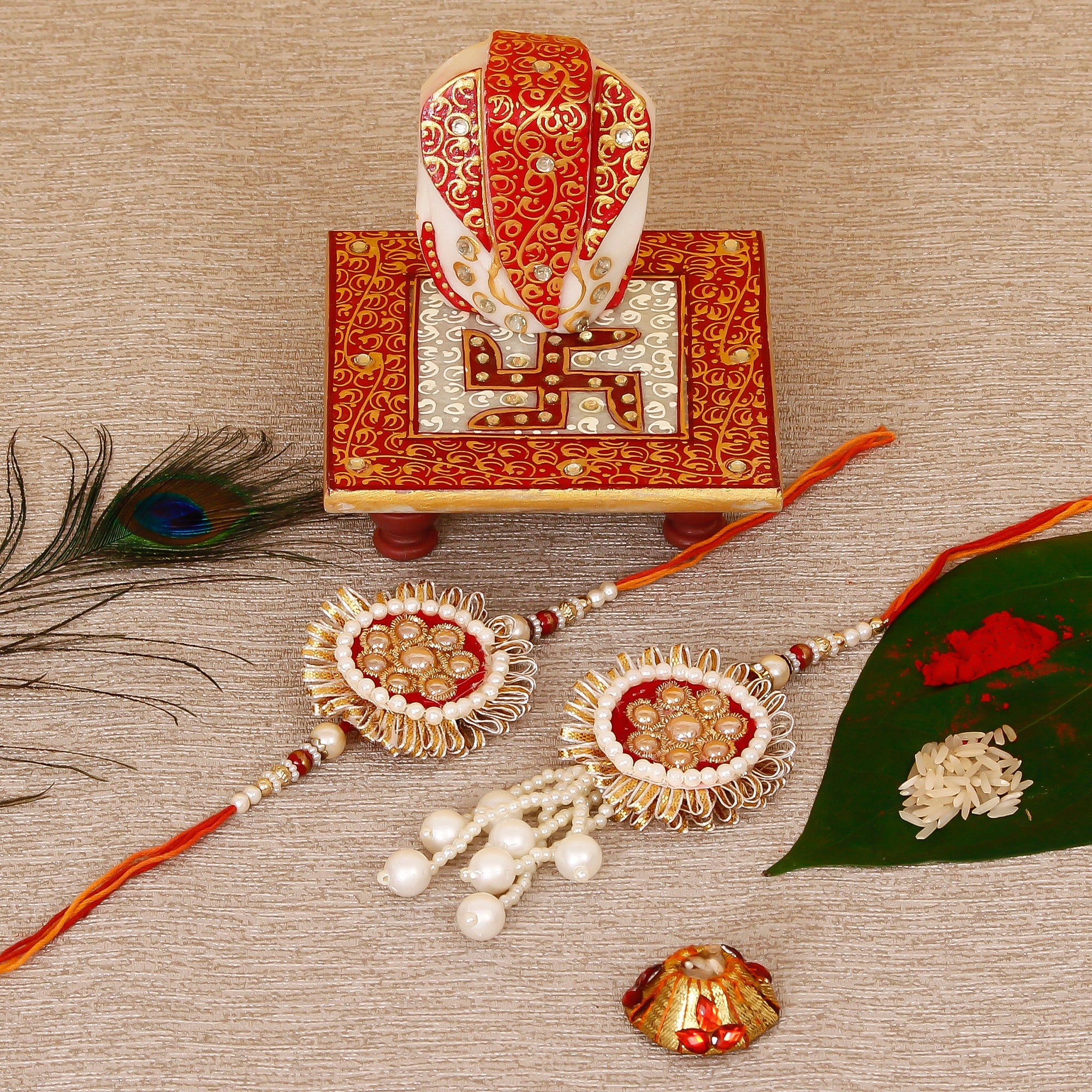Designer Bhaiya Bhabhi Rakhi with Ridhi Sidhi Marble chowki and Roli Tikka Matki Kafalo