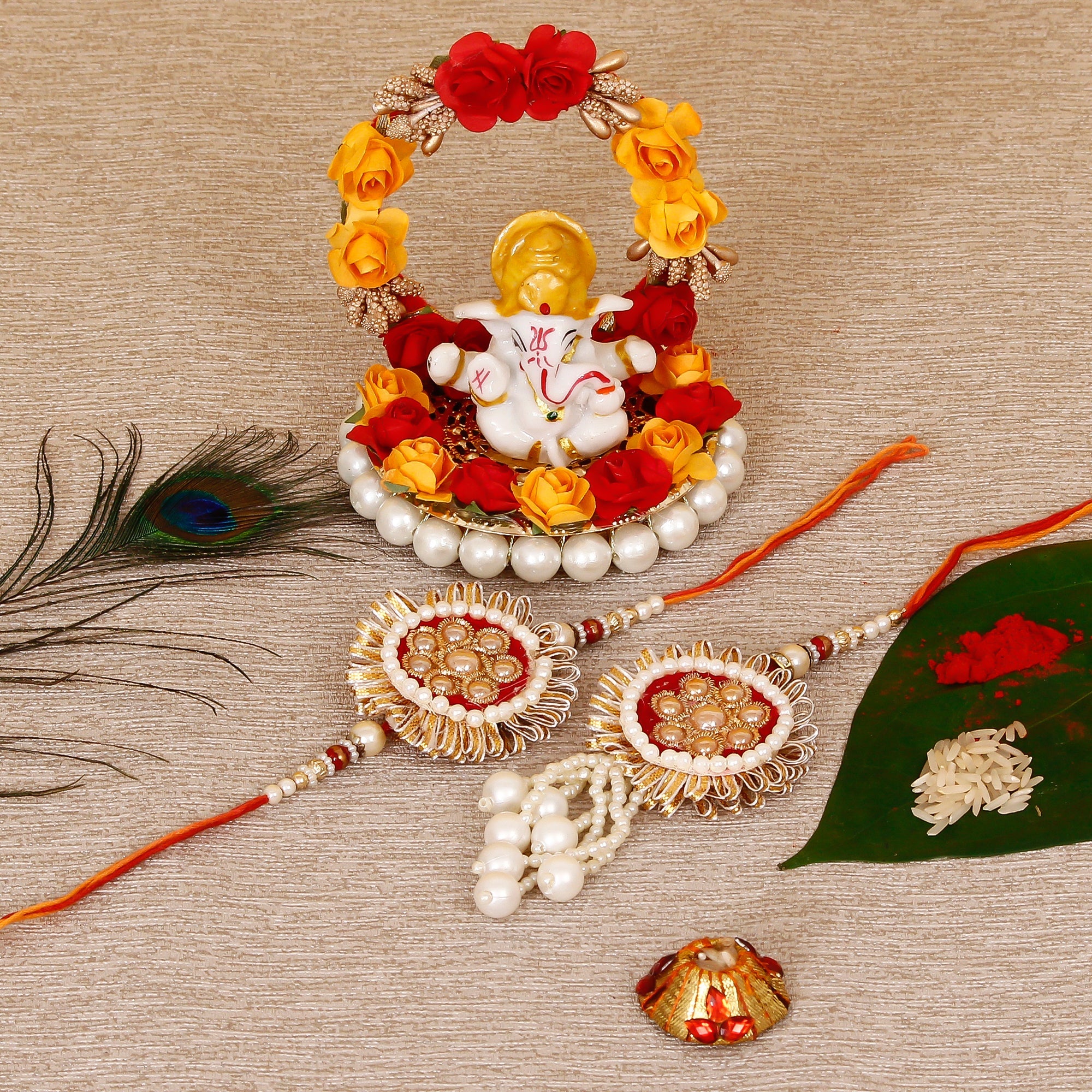 Designer Bhaiya Bhabhi Rakhi with Lord Ganesha Idol on Decorative Plate for Car & Home and Roli Tikka Matki Kafalo