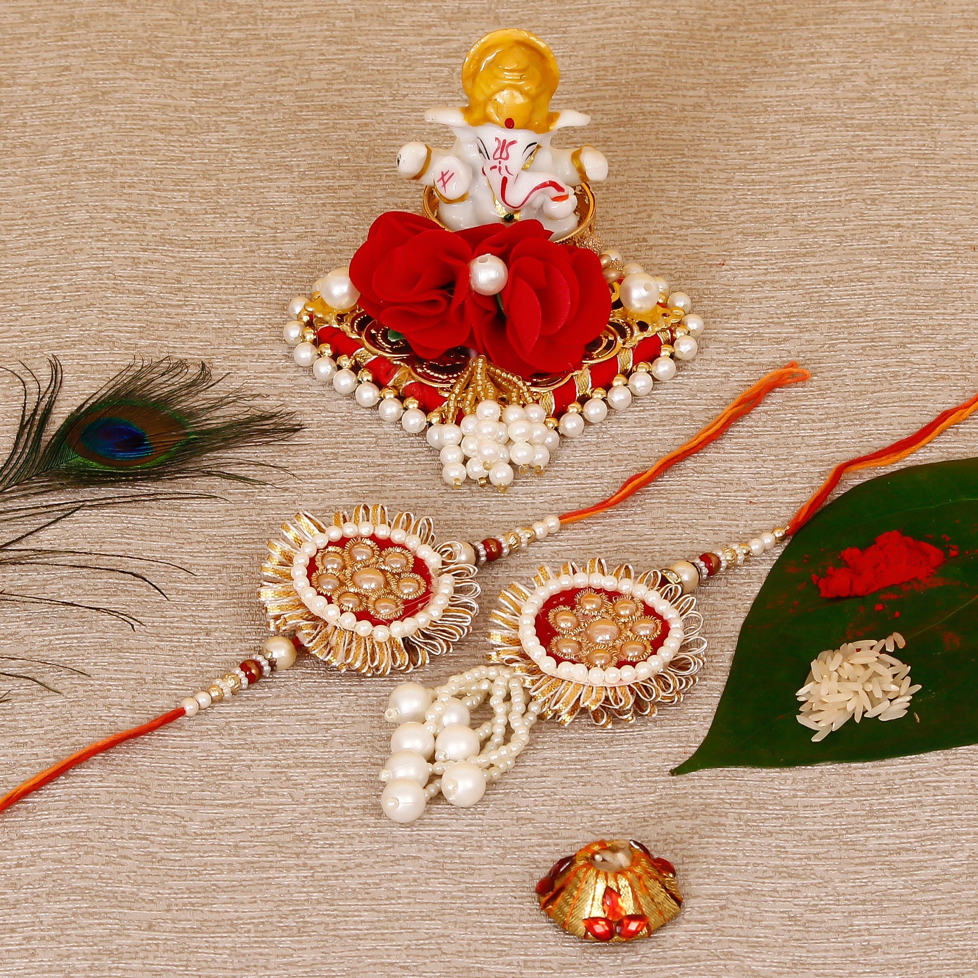 Designer Bhaiya Bhabhi Rakhi with Lord Ganesha Idol on Decorative Plate for Car & Home and Roli Tikka Matki Kafalo