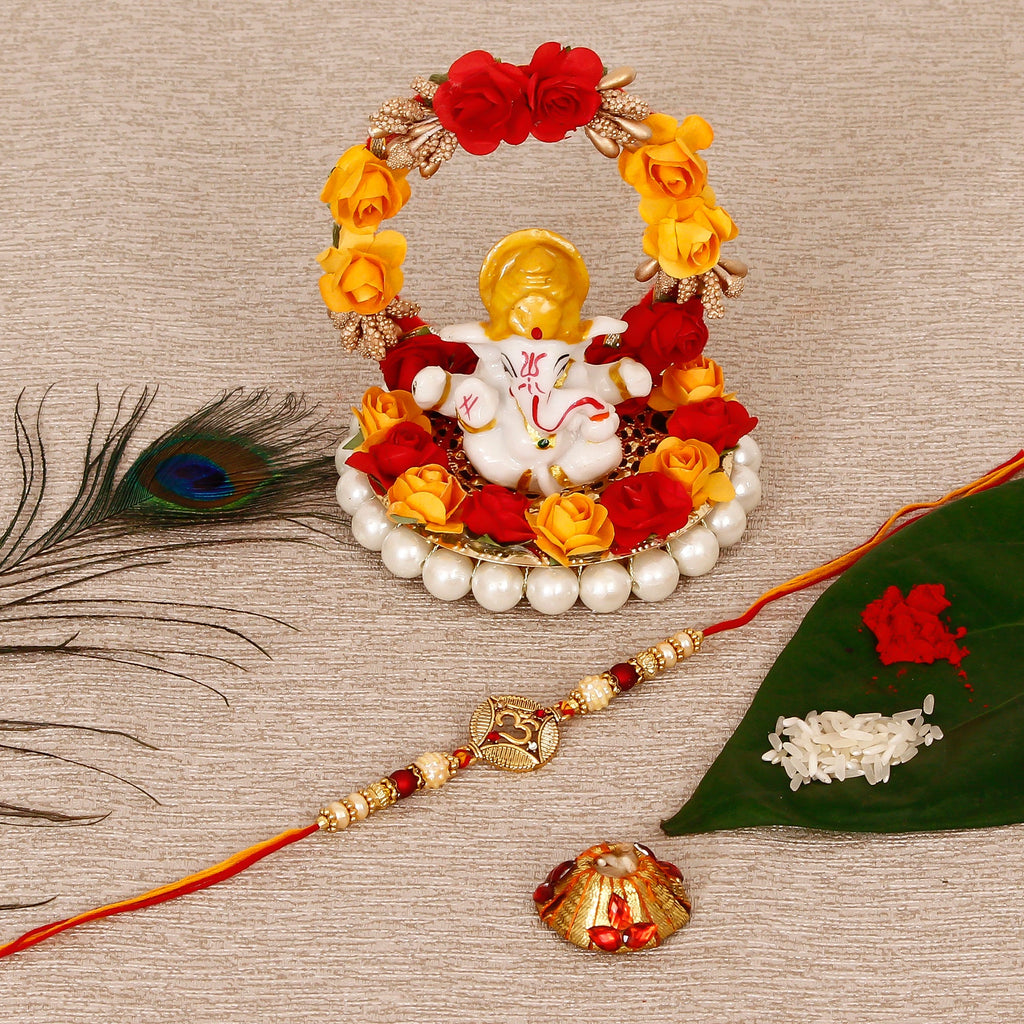 Designer OM Rakhi with Lord Ganesha Idol on Decorative Plate for Car & Home and Roli Tikka Matki Kafalo
