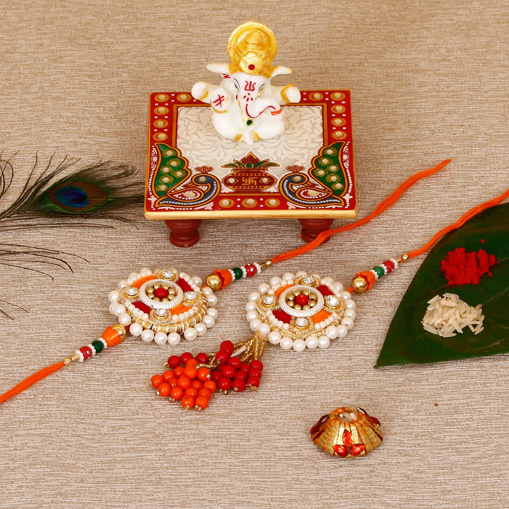 Designer Bhaiya Bhabhi Rakhi with Lord Ganesha Marble Chowki and Roli Tikka Matki Kafalo