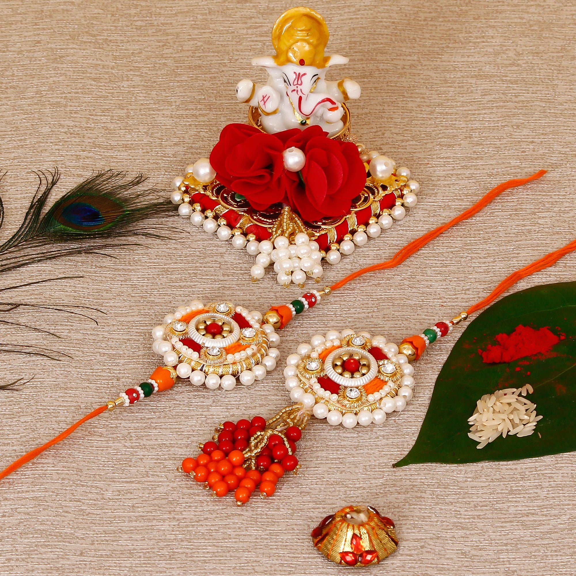 Designer Bhaiya Bhabhi Rakhi with Lord Ganesha Idol on Decorative Plate for Car & Home and Roli Tikka Matki Kafalo
