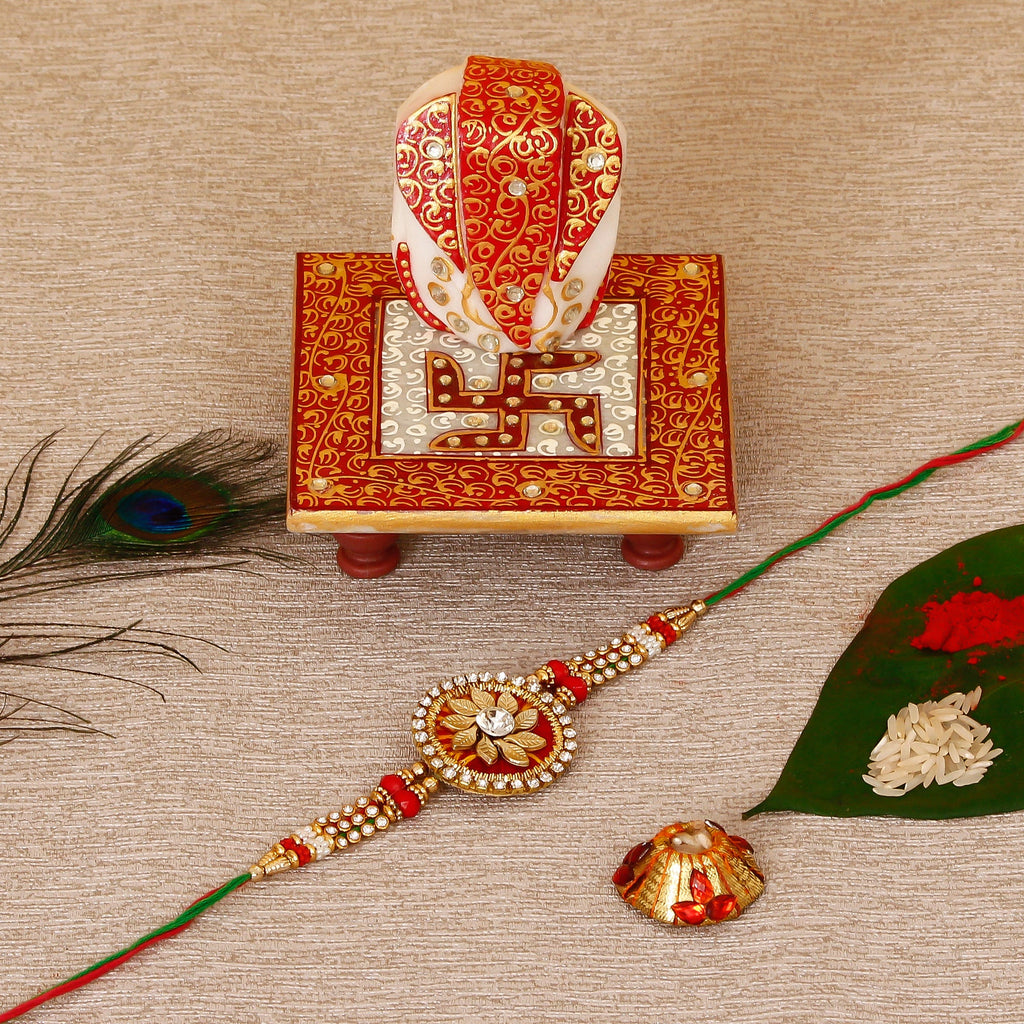 Designer Rakhi with Ridhi Sidhi Marble chowki and Roli Tikka Matki Kafalo