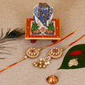 Designer Bhaiya Bhabhi Rakhi with Lord Ganesha on Marble Chowki and Roli Tikka Matki Kafalo