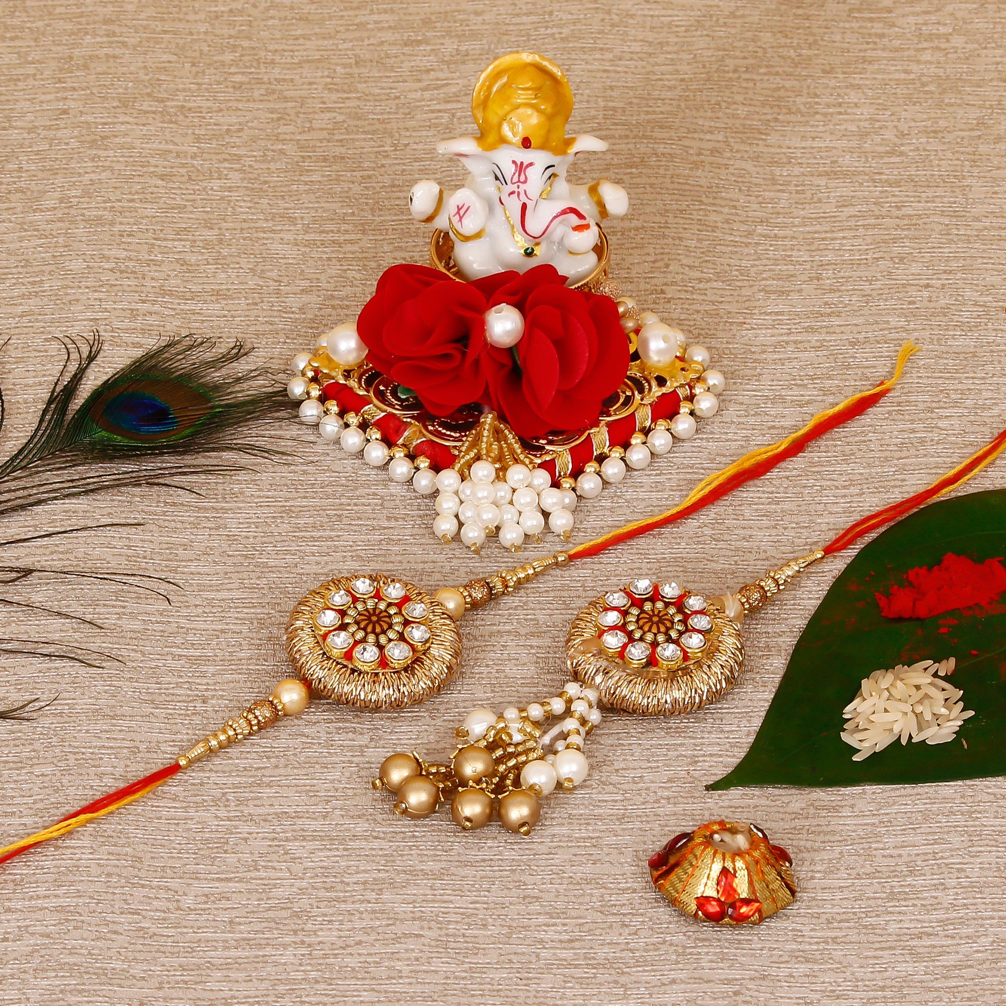 Designer Bhaiya Bhabhi Rakhi with Lord Ganesha Idol on Decorative Plate for Car & Home and Roli Tikka Matki Kafalo