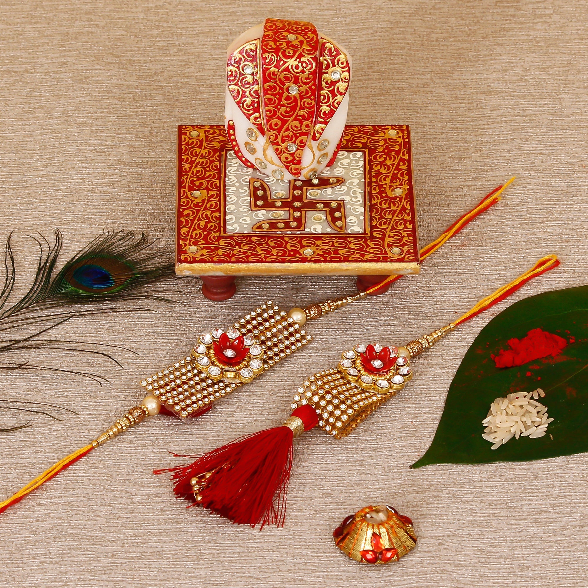 Designer Bhaiya Bhabhi Rakhi with Ridhi Sidhi Marble chowki and Roli Tikka Matki Kafalo