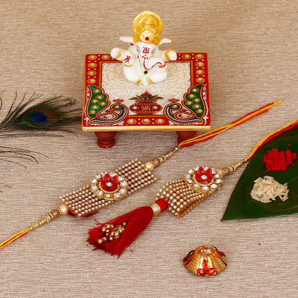 Designer Bhaiya Bhabhi Rakhi with Lord Ganesha Marble Chowki and Roli Tikka Matki Kafalo