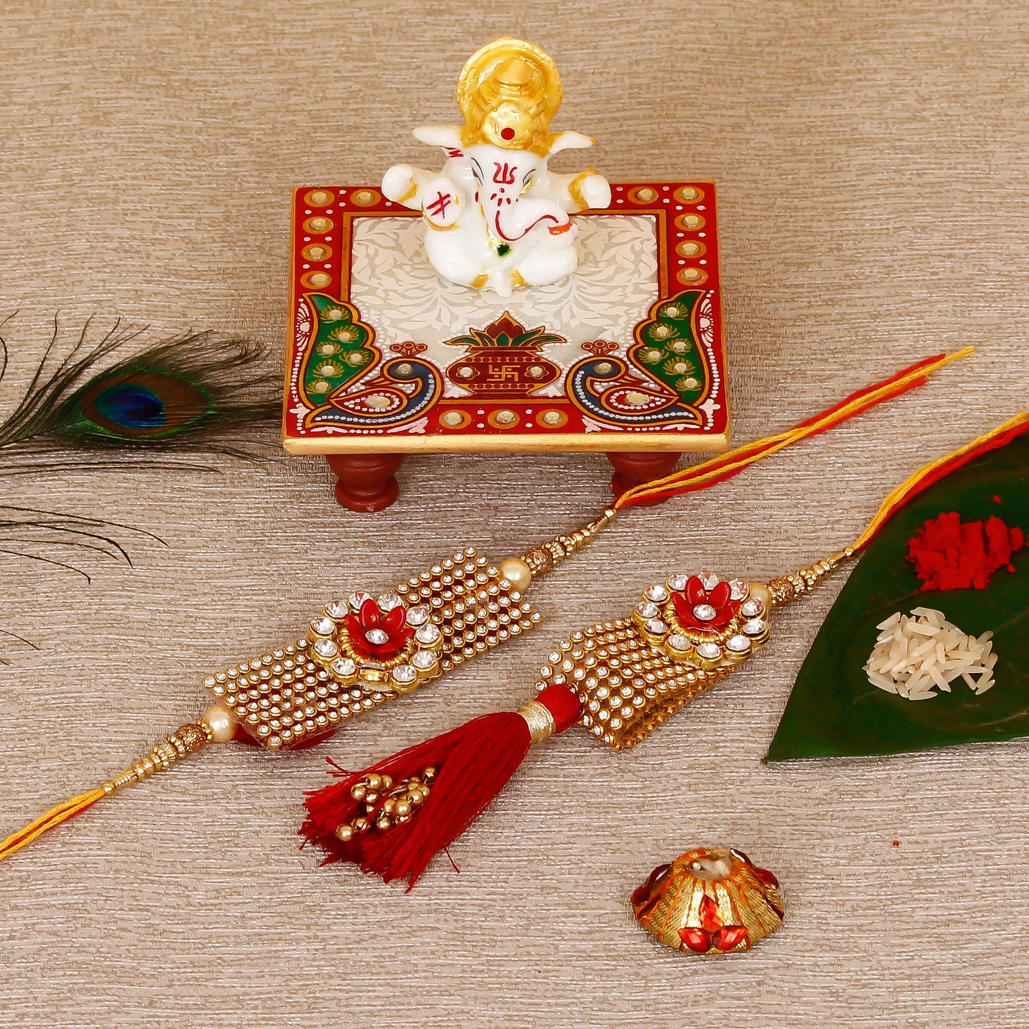 Designer Bhaiya Bhabhi Rakhi with Lord Ganesha Marble Chowki and Roli Tikka Matki Kafalo