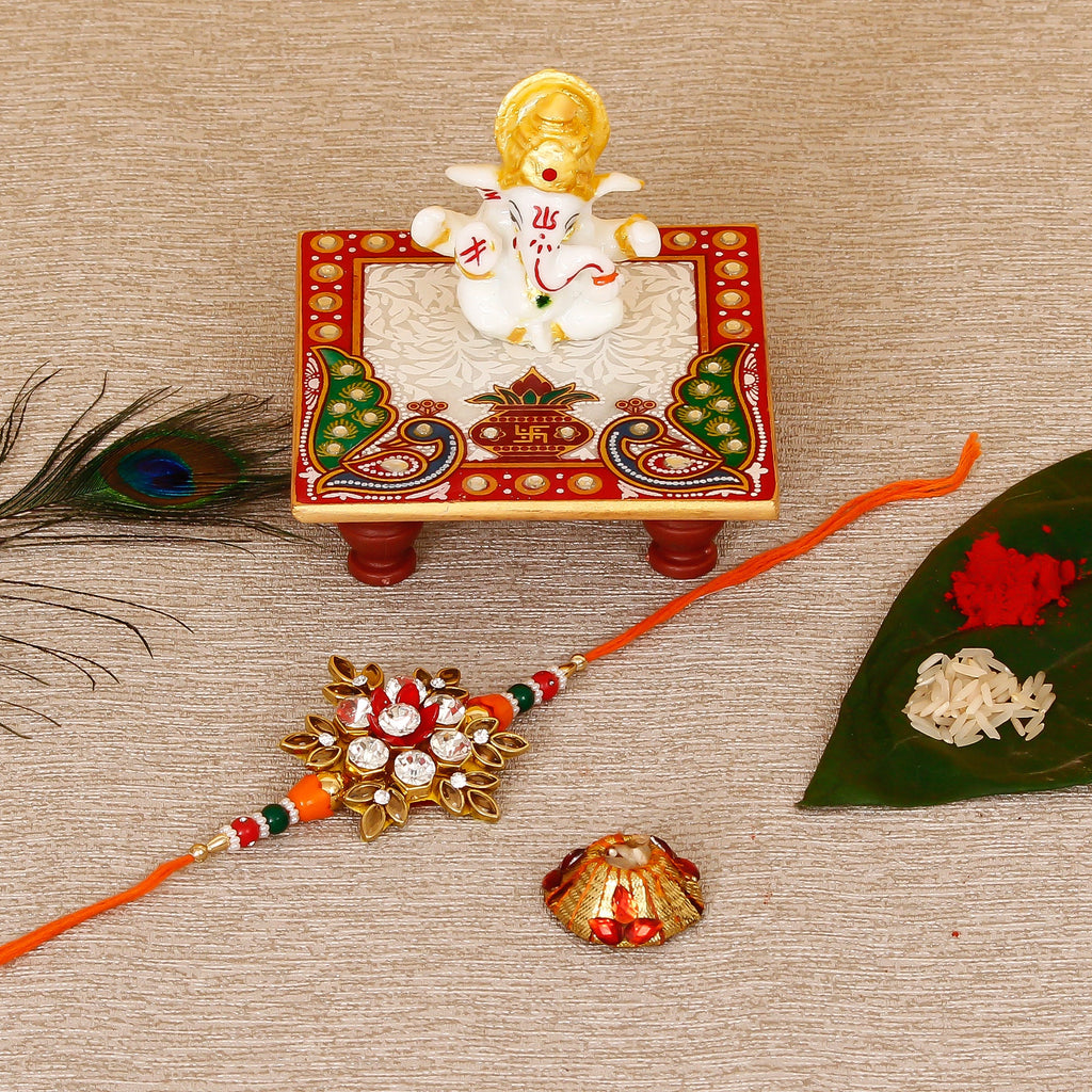Designer Rakhi with Lord Ganesha Marble Chowki and Roli Tikka Matki Kafalo