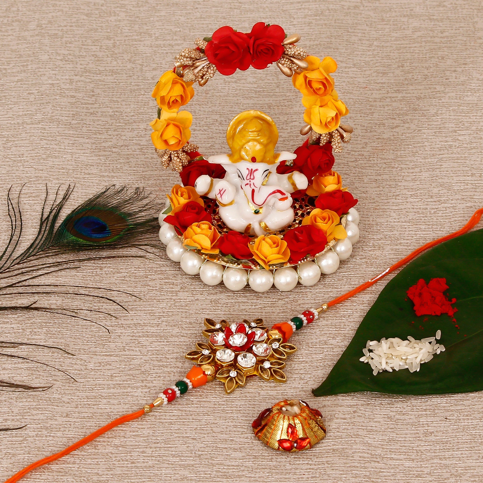Designer Rakhi with Lord Ganesha Idol on Decorative Plate for Car & Home and Roli Tikka Matki Kafalo