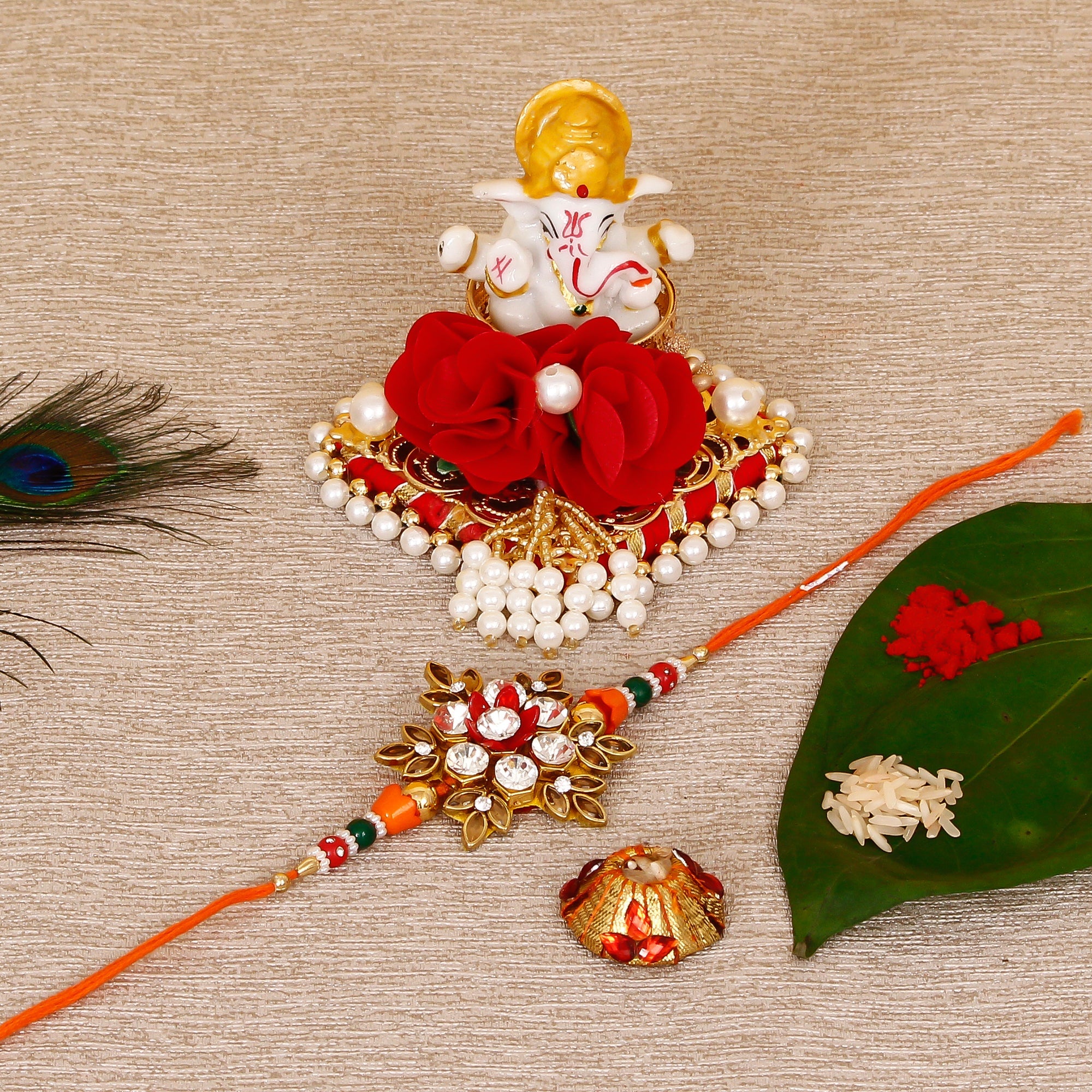 Designer Rakhi with Lord Ganesha Idol on Decorative Plate for Car & Home and Roli Tikka Matki Kafalo