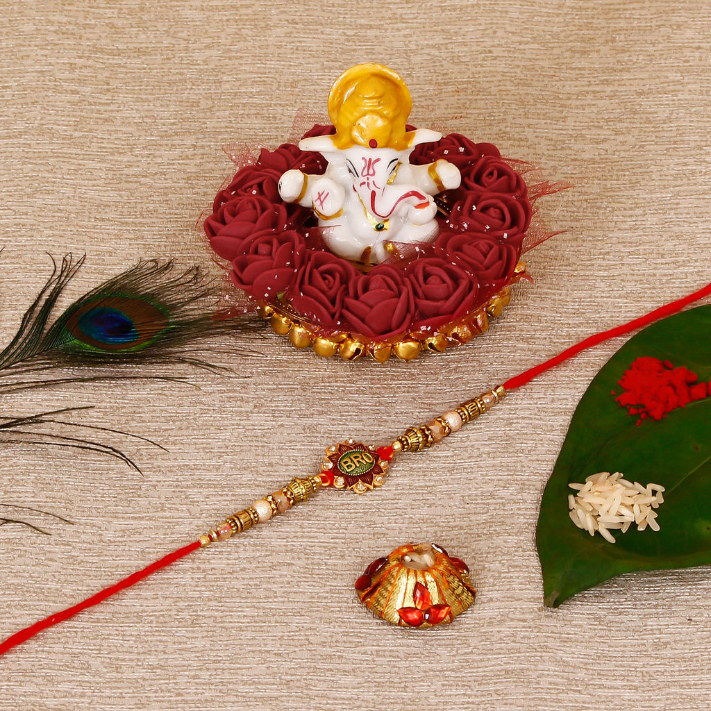 Designer Rakhi with Lord Ganesha Idol on Decorative Plate for Car & Home and Roli Tikka Matki Kafalo