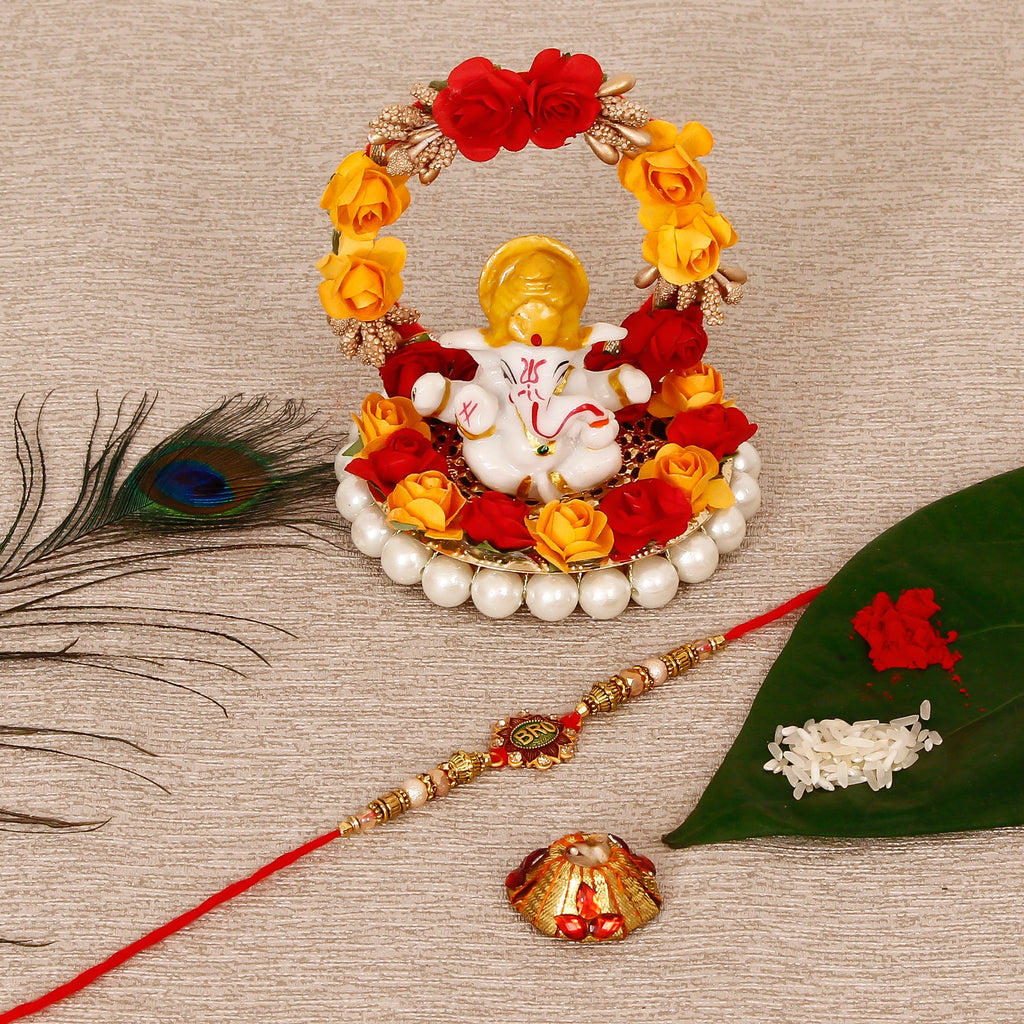 Designer Rakhi with Lord Ganesha Idol on Decorative Plate for Car & Home and Roli Tikka Matki Kafalo