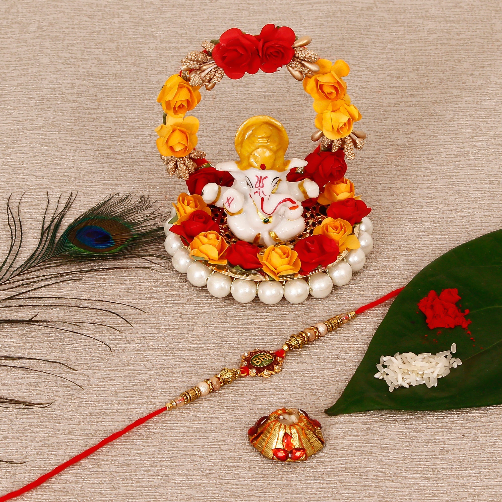 Designer Rakhi with Lord Ganesha Idol on Decorative Plate for Car & Home and Roli Tikka Matki Kafalo