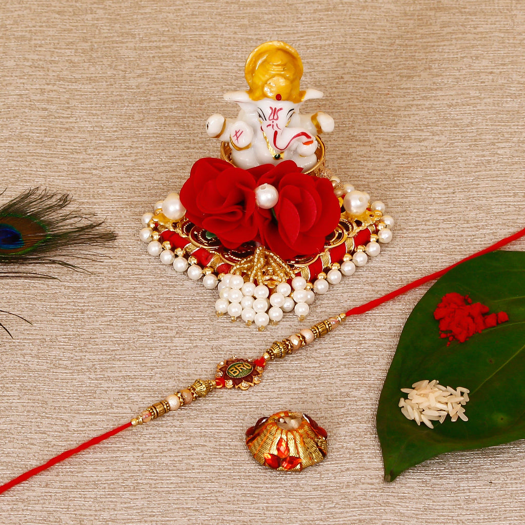 Designer Rakhi with Lord Ganesha Idol on Decorative Plate for Car & Home and Roli Tikka Matki Kafalo