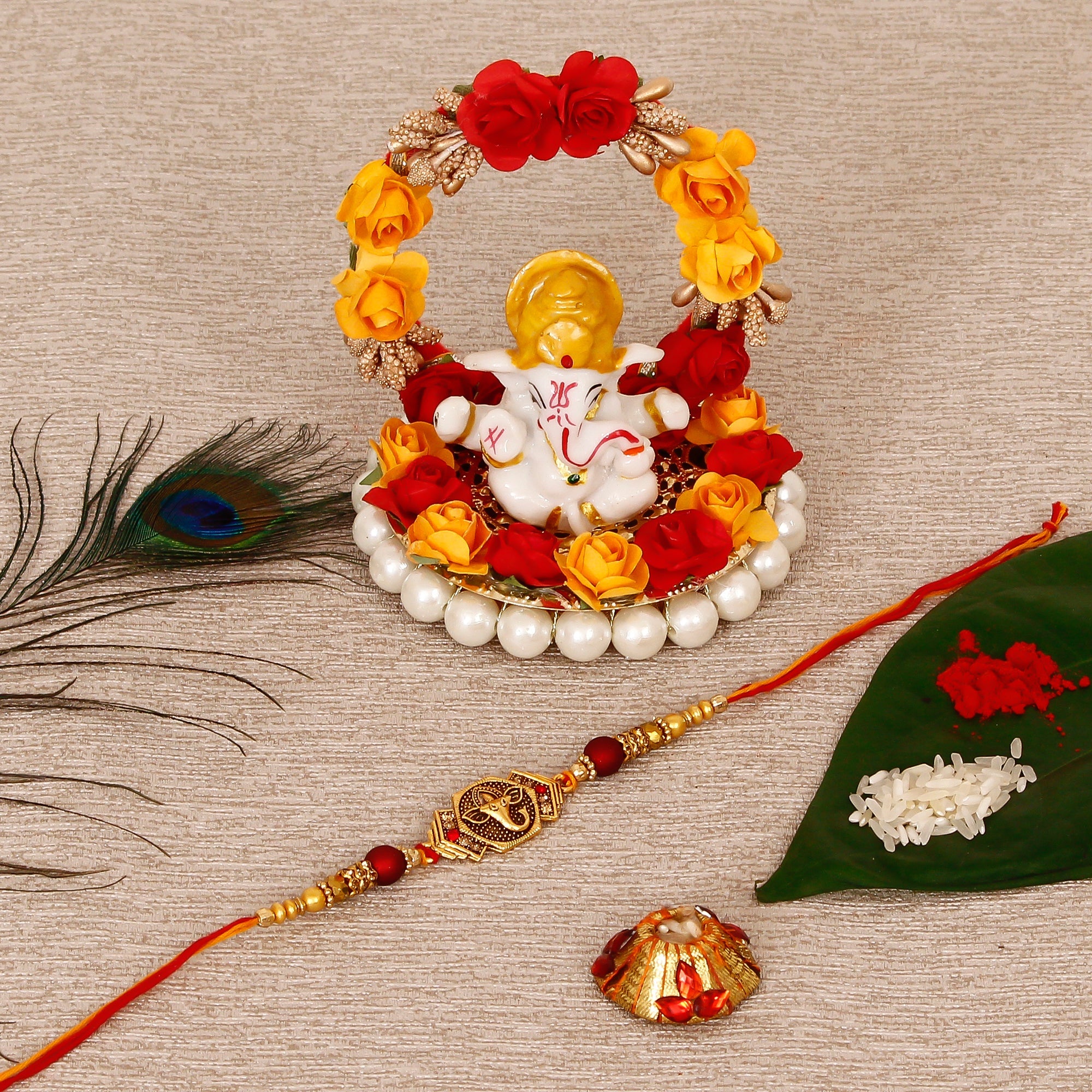 Designer Religious Ganesha Rakhi with Lord Ganesha Idol on Decorative Plate for Car & Home and Roli Tikka Matki Kafalo