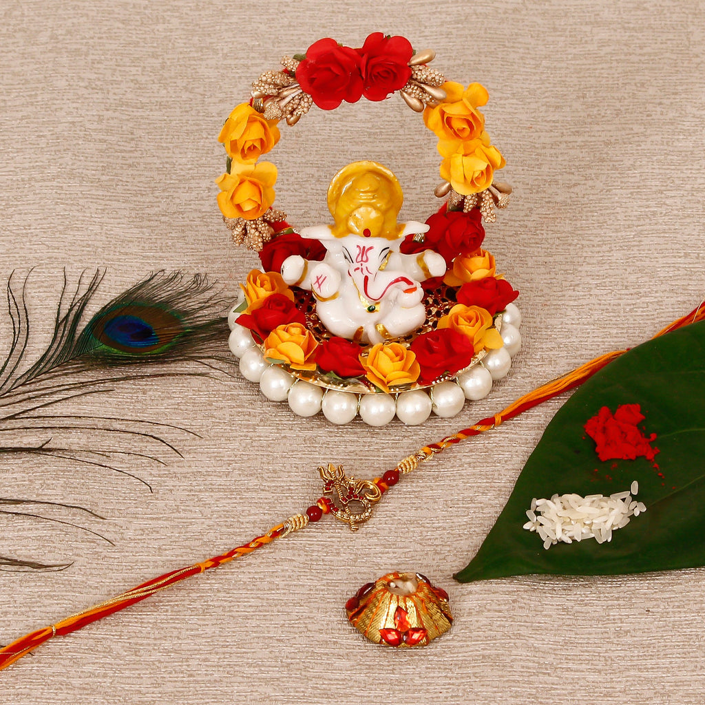 Designer Religious OM Rakhi with Lord Ganesha Idol on Decorative Plate for Car & Home and Roli Tikka Matki Kafalo