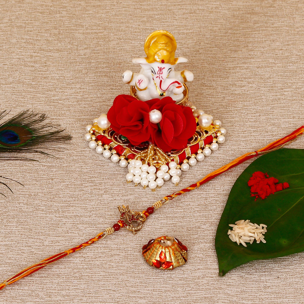 Designer Religious OM Rakhi with Lord Ganesha Idol on Decorative Plate for Car & Home and Roli Tikka Matki Kafalo