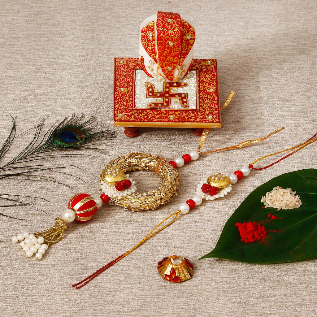 Designer Bhaiya Bhabhi Rakhi with Ridhi Sidhi Marble chowki and Roli Tikka Matki Kafalo