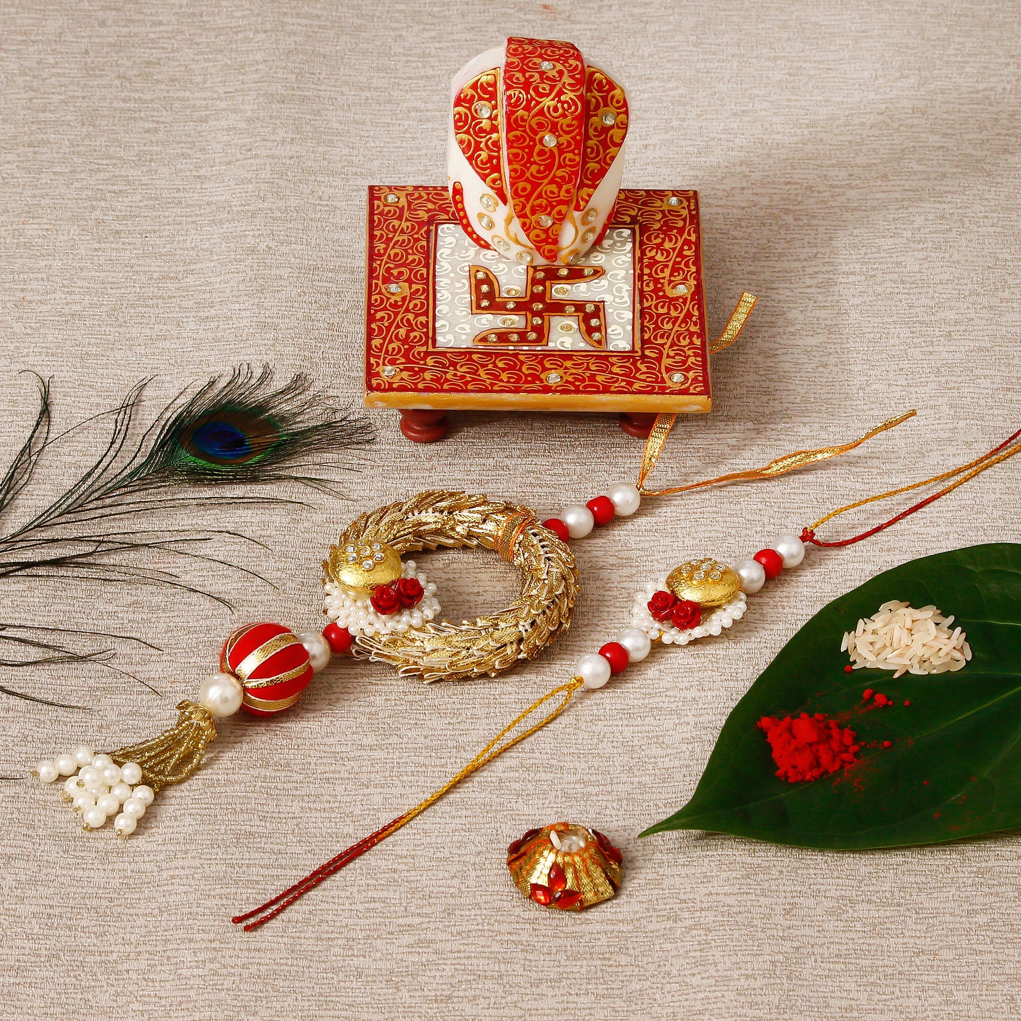 Designer Bhaiya Bhabhi Rakhi with Ridhi Sidhi Marble chowki and Roli Tikka Matki Kafalo