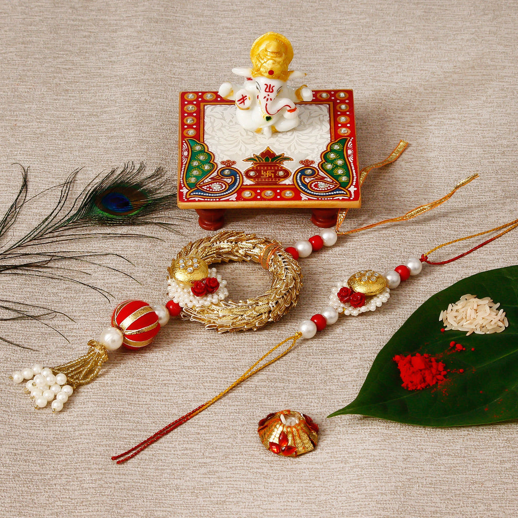 Designer Bhaiya Bhabhi Rakhi with Lord Ganesha Marble Chowki and Roli Tikka Matki Kafalo