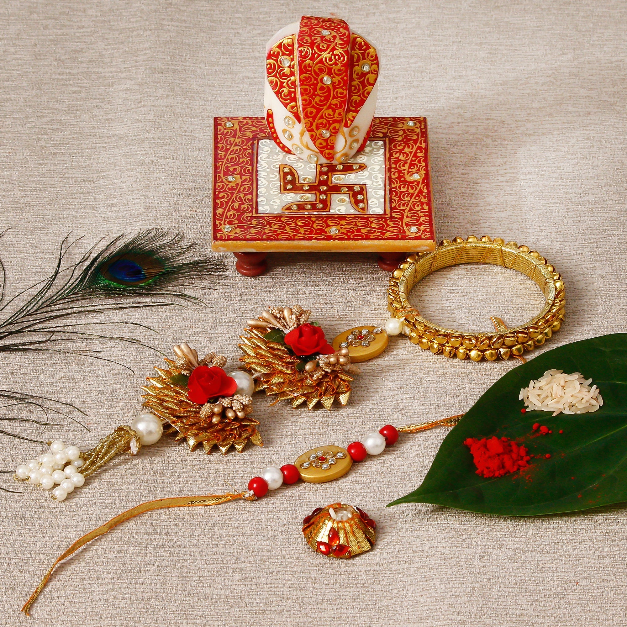 Designer Bhaiya Bhabhi Rakhi with Ridhi Sidhi Marble chowki and Roli Tikka Matki Kafalo