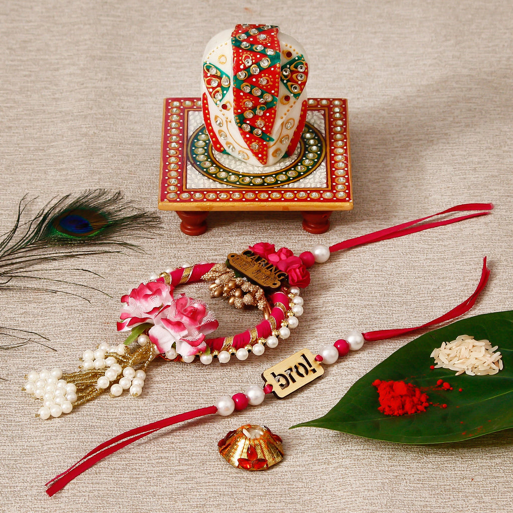 Designe Bhaiya Bhabhi Rakhi with Lord Ganesha on Kundan Studded Marble Chowki and Roli Tikka Matki Kafalo