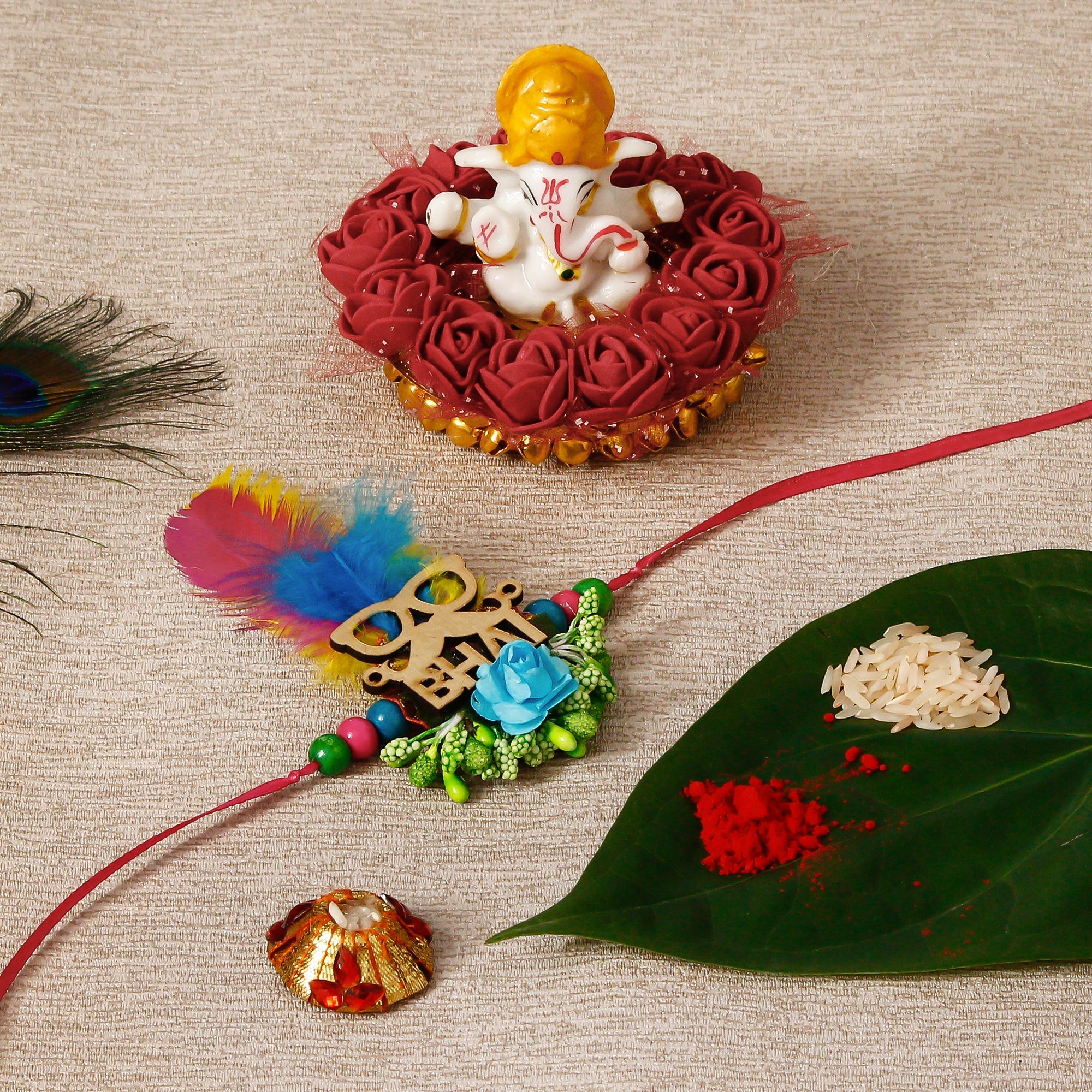 Designer Rakhi with Lord Ganesha Idol on Decorative Plate for Car & Home and Roli Tikka Matki Kafalo