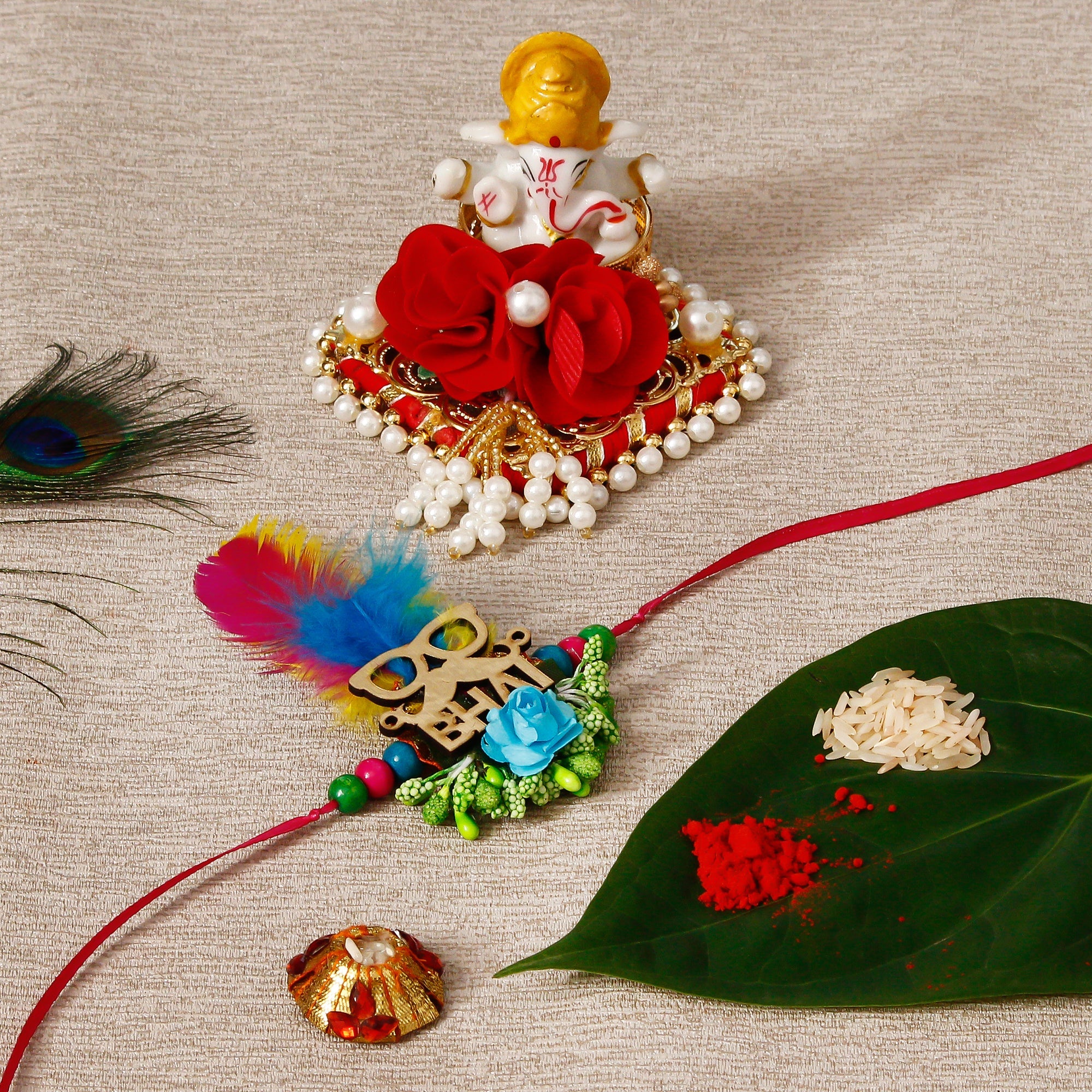 Designer Rakhi with Lord Ganesha Idol on Decorative Plate for Car & Home and Roli Tikka Matki Kafalo
