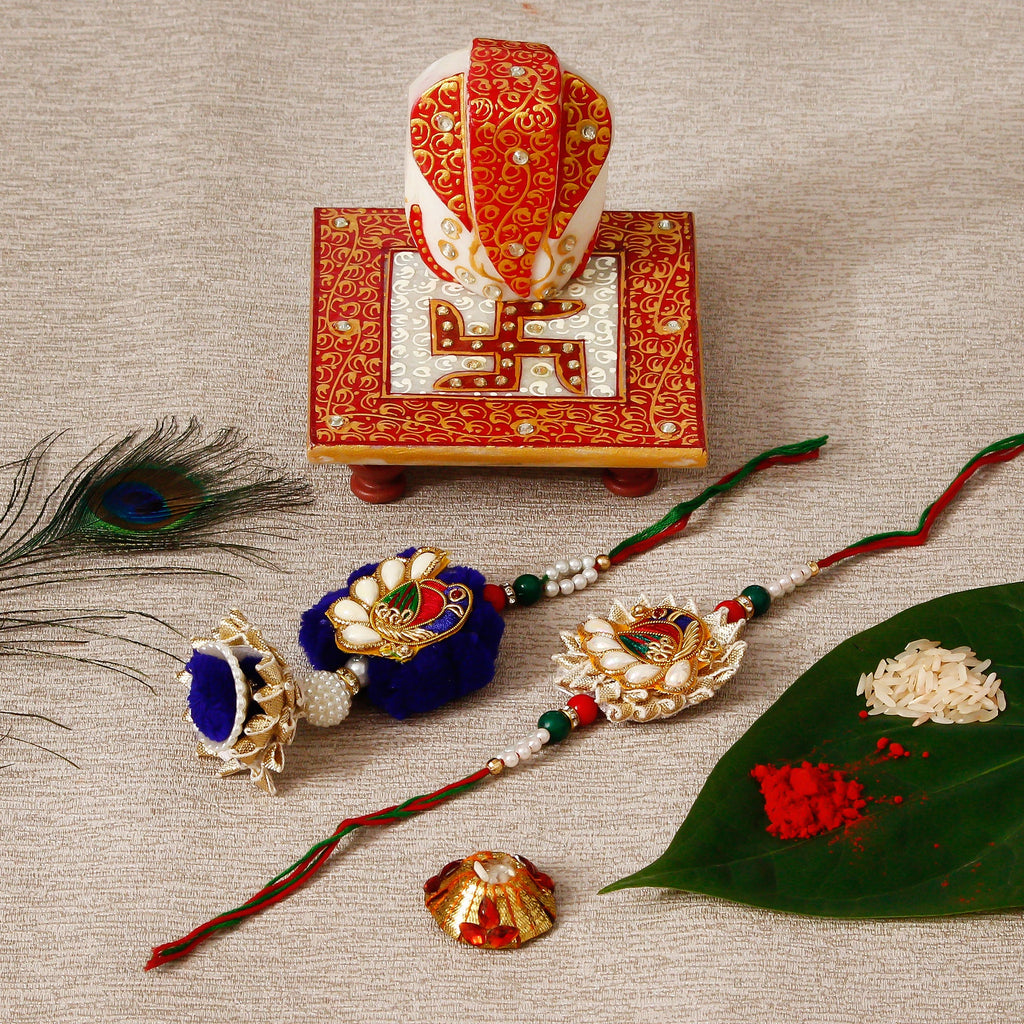 Designer Bhaiya Bhabhi Rakhi with Ridhi Sidhi Marble chowki and Roli Tikka Matki Kafalo