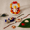 Designer Bhaiya Bhabhi Rakhi with Lord Ganesha Idol on Decorative Plate for Car & Home and Roli Tikka Matki Kafalo