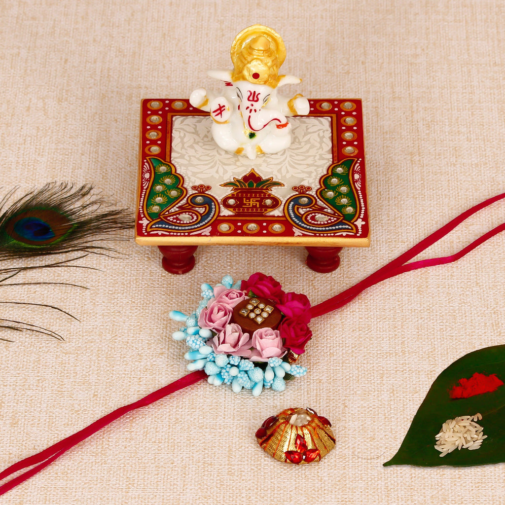 Designer Floral Rakhi with Lord Ganesha Marble Chowki and Roli Tikka Matki Kafalo