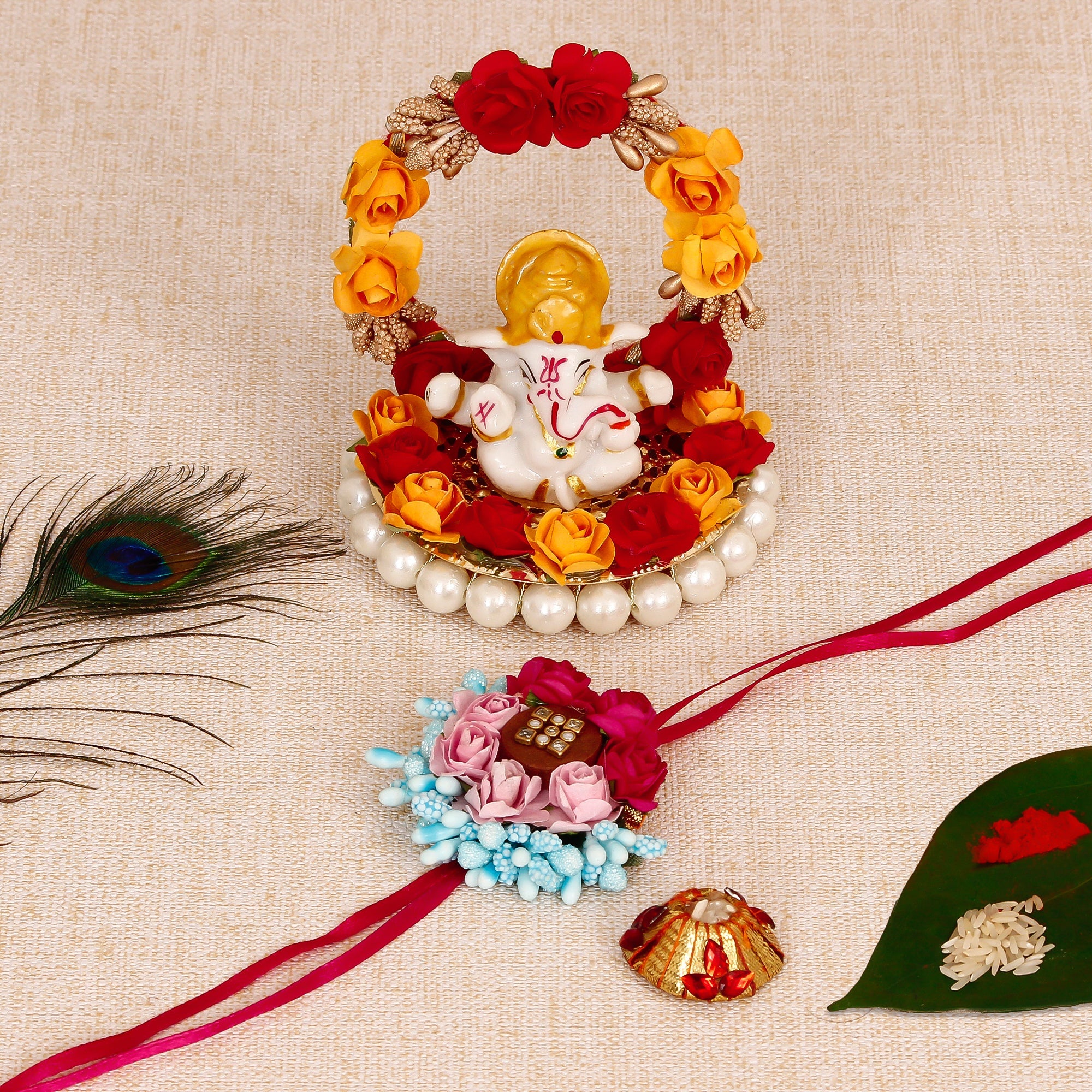 Designer Floral Rakhi with Lord Ganesha Idol on Decorative Plate for Car & Home and Roli Tikka Matki Kafalo