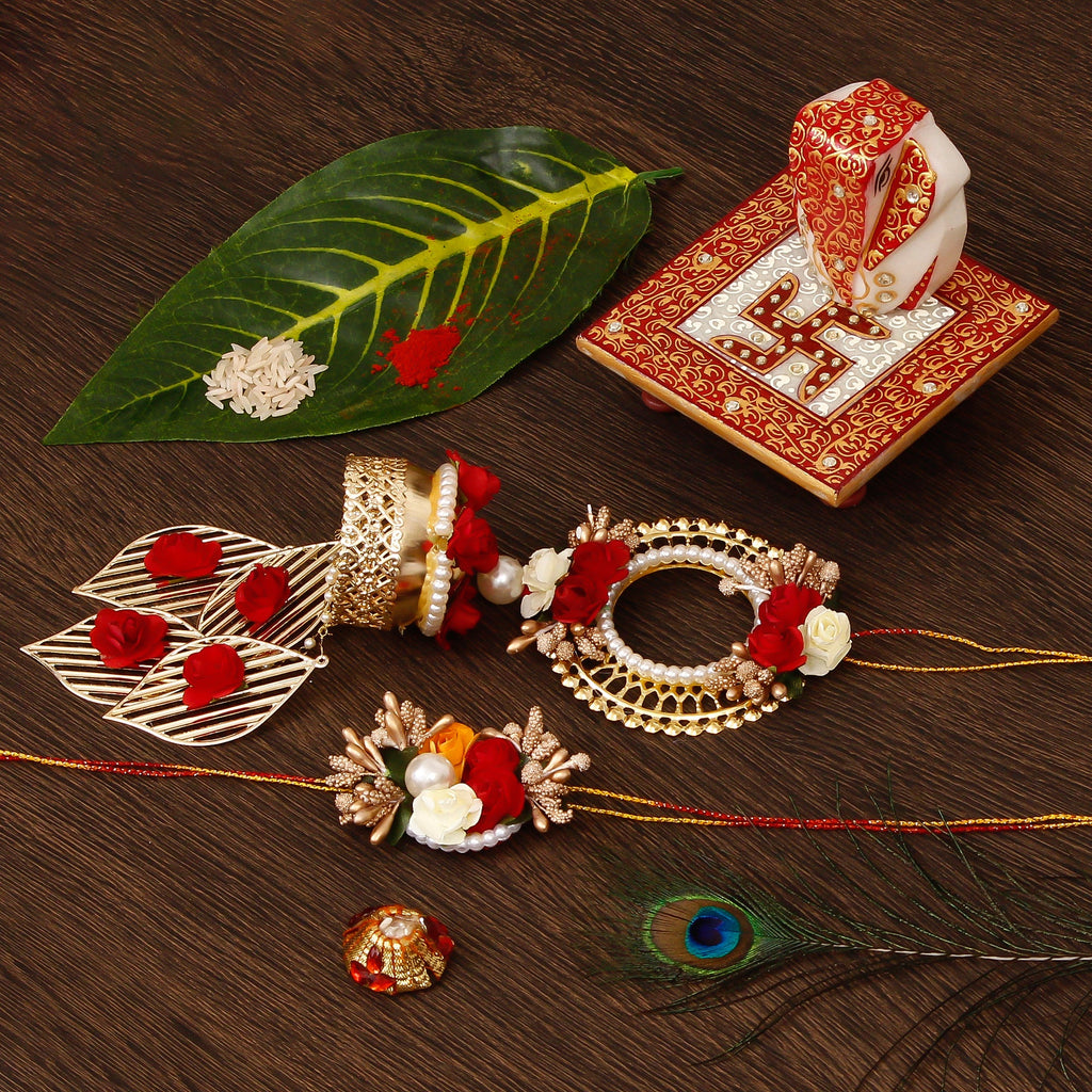 Designer Handcrafted Bhaiya Bhabhi Rakhi with Ridhi Sidhi Marble chowki and Roli Tikka Matki Kafalo