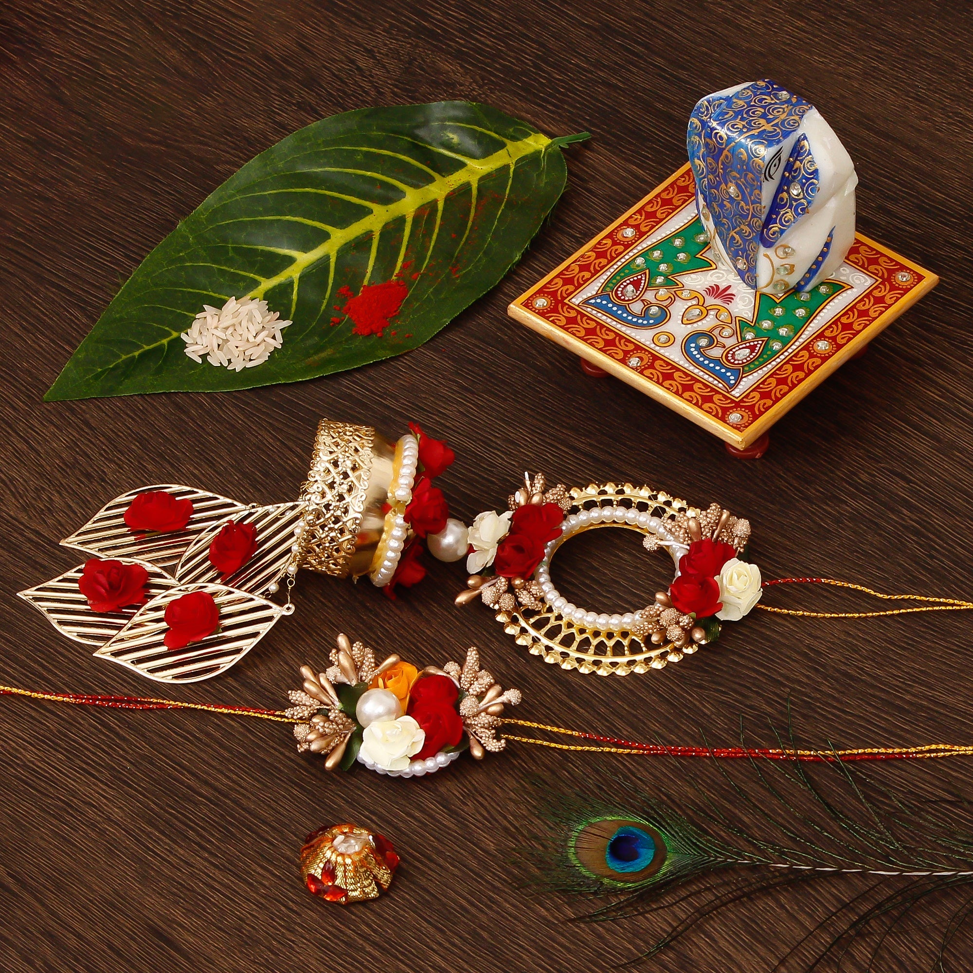 Designer Handcrafted Bhaiya Bhabhi Rakhi with Lord Ganesha on Marble Chowki and Roli Tikka Matki Kafalo