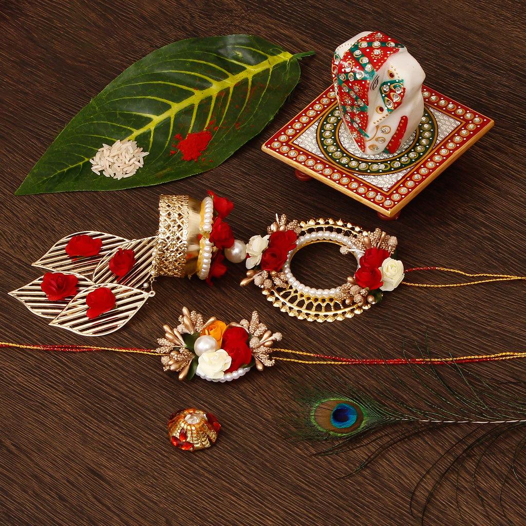 Designer Handcrafted Bhaiya Bhabhi Rakhi with Lord Ganesha on Kundan Studded Marble Chowki and Roli Tikka Matki Kafalo