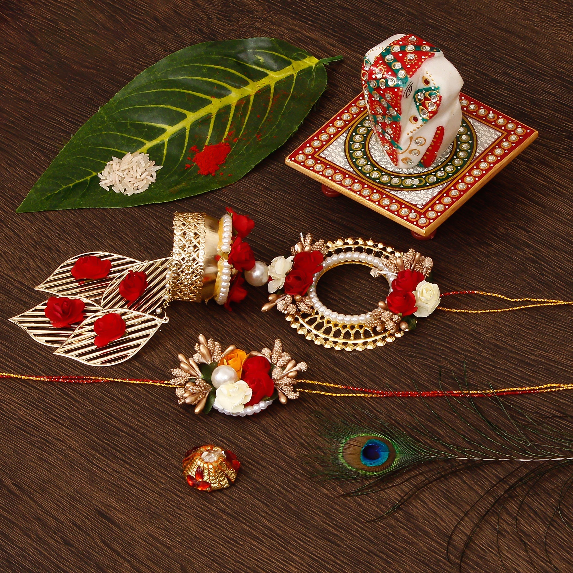 Designer Handcrafted Bhaiya Bhabhi Rakhi with Lord Ganesha on Kundan Studded Marble Chowki and Roli Tikka Matki Kafalo